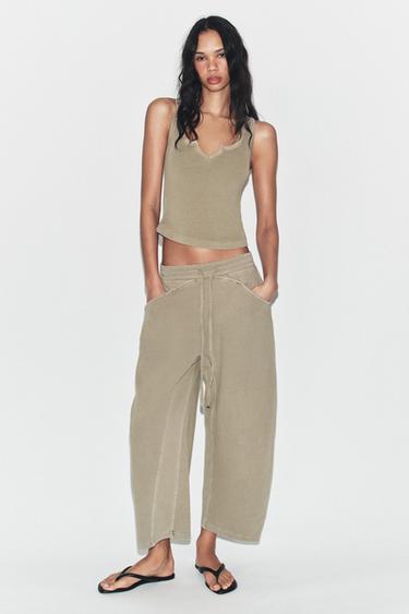 БРЮКИ ИЗ МЯГКОЙ ТКАНИ С ЭФФЕКТОМ ПОТЕРТОСТИ — ТЕМНО-БЕЖЕВЫЙ от Zara