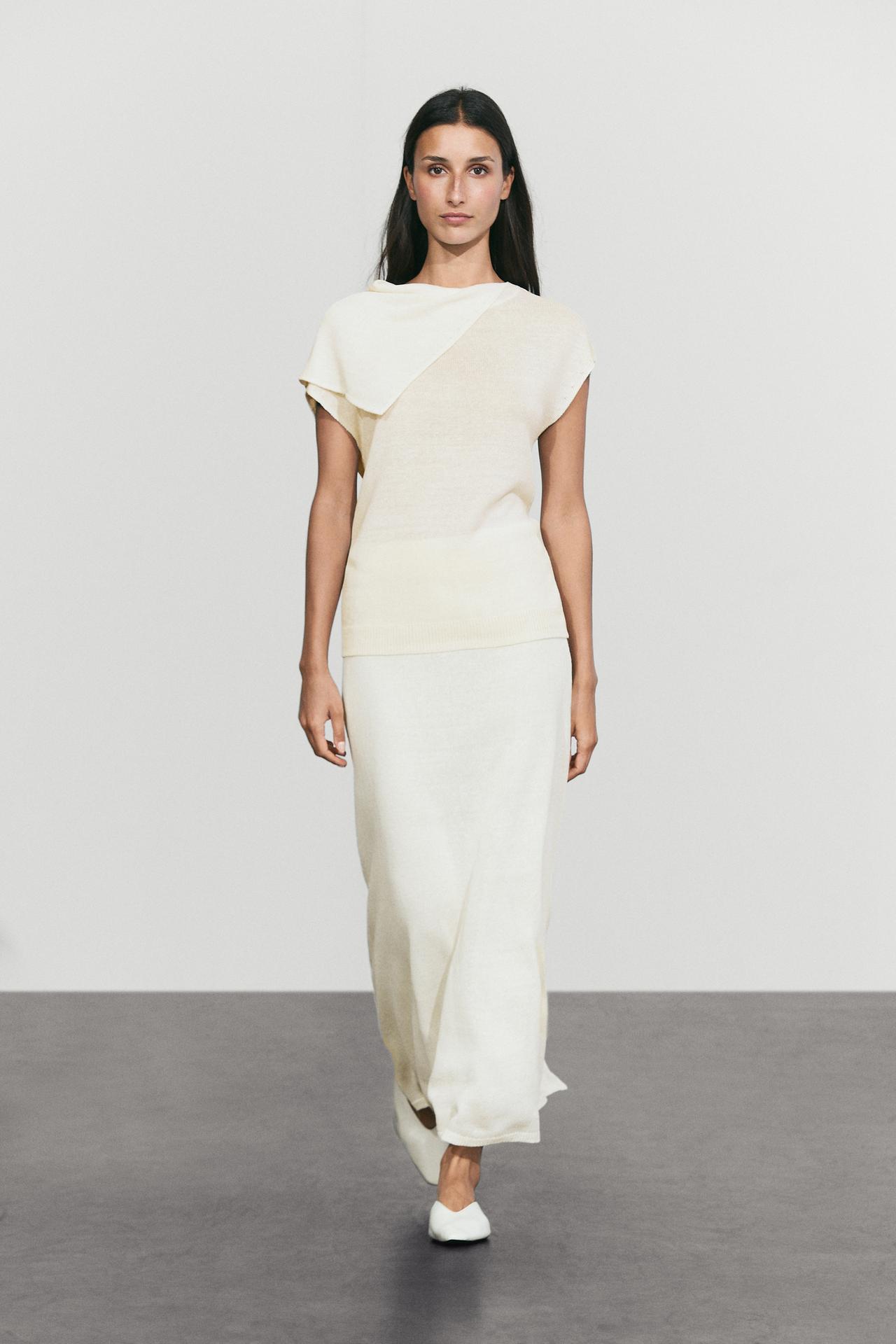 Flowing top with asymmetric neckline — Oyster-white