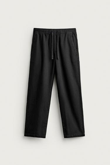 بنطلون RELAXED FIT هيكلي - أسود الخاص بـ Zara