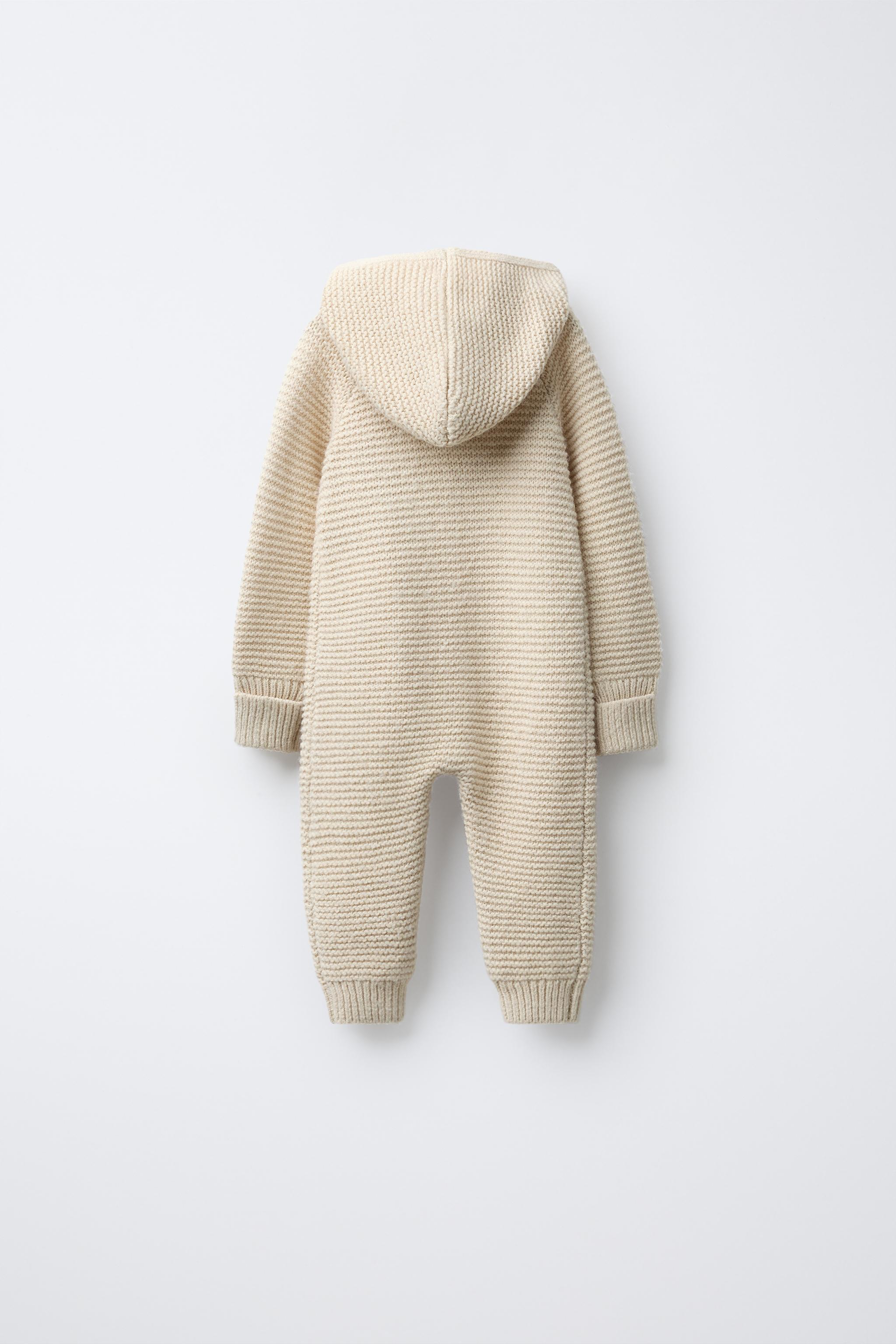 HOODED CHUNKY KNIT JUMPSUIT