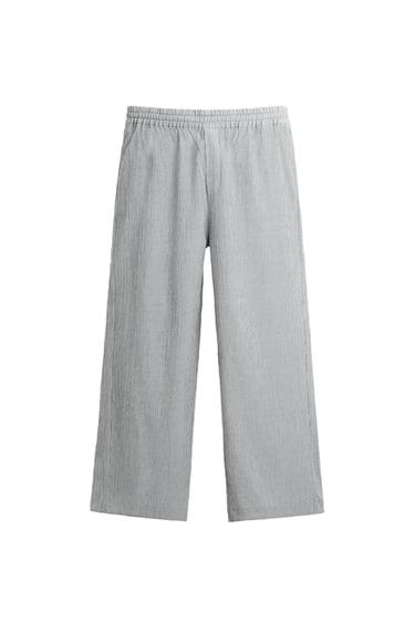 PLEATED TROUSERS