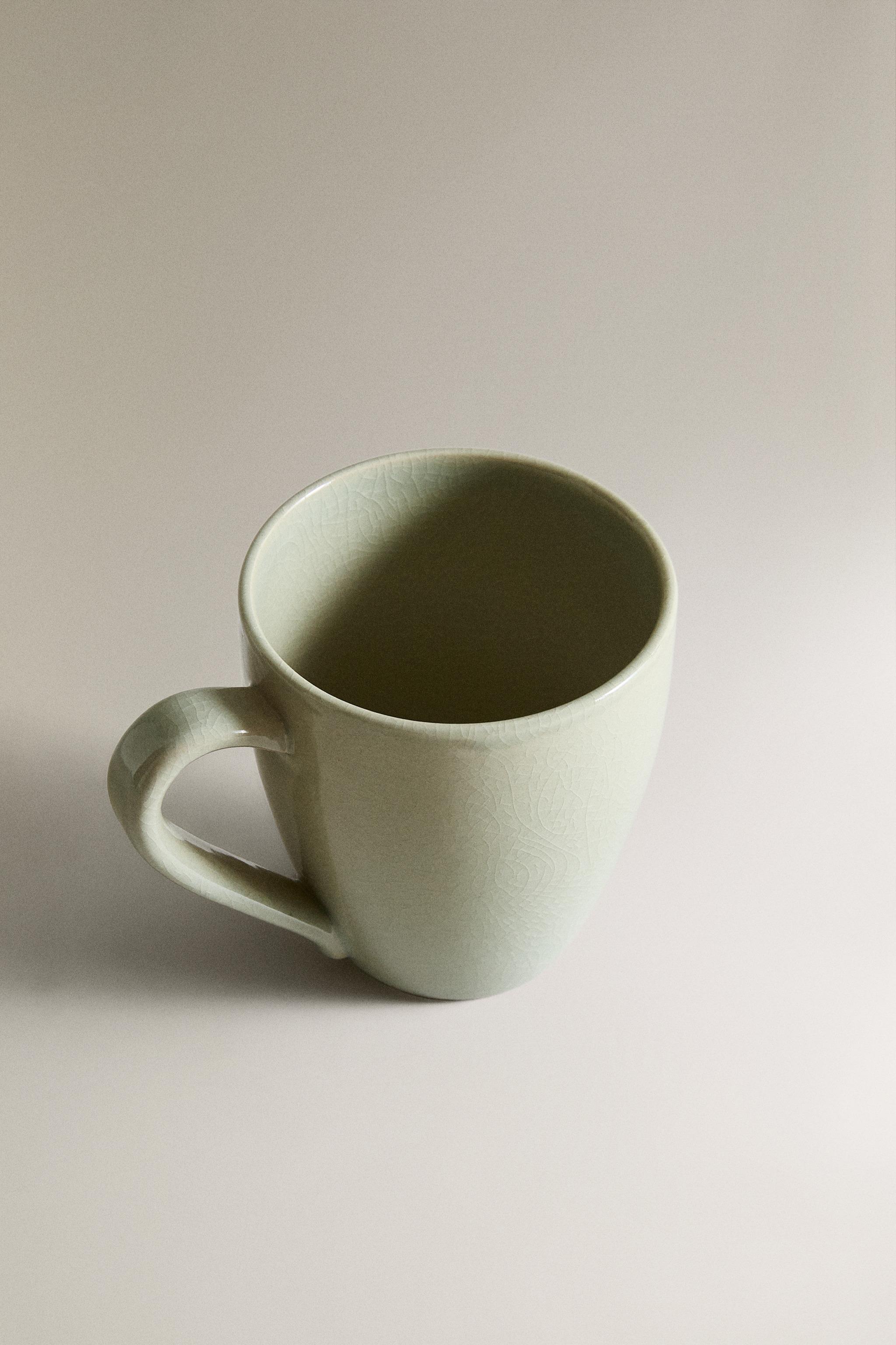 ENAMELED STONEWARE MUG