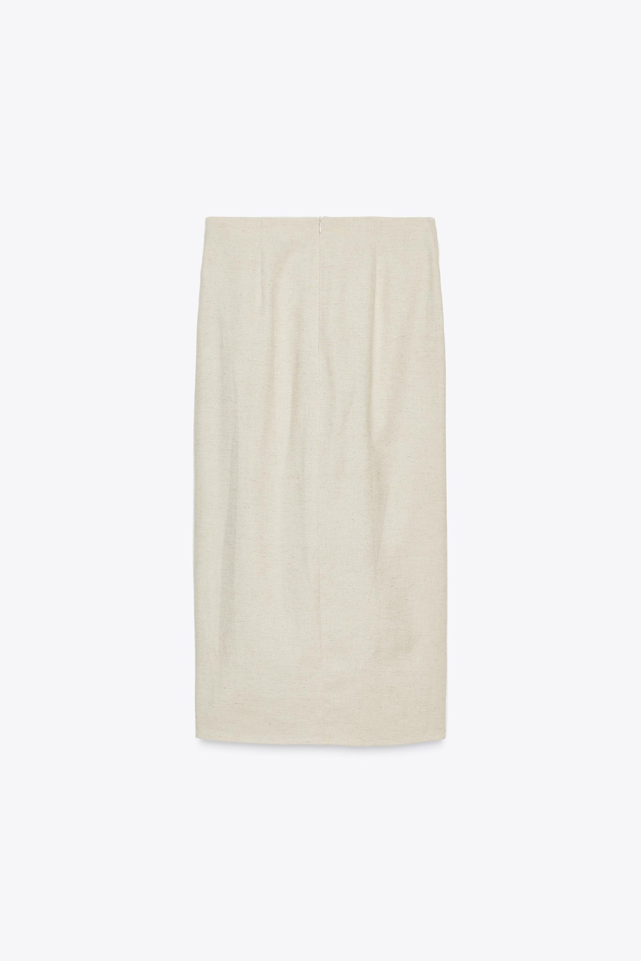 BUCKLE MIDI SKIRT