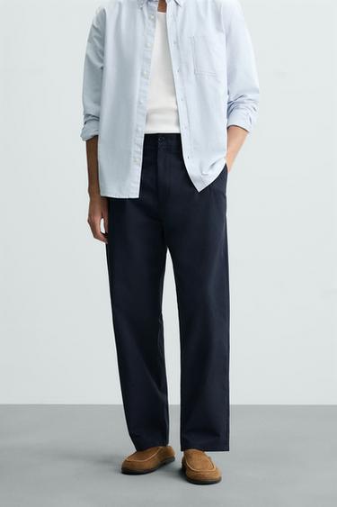 PANTALÓN REGULAR FIT PLIEGUES - Marino de Zara