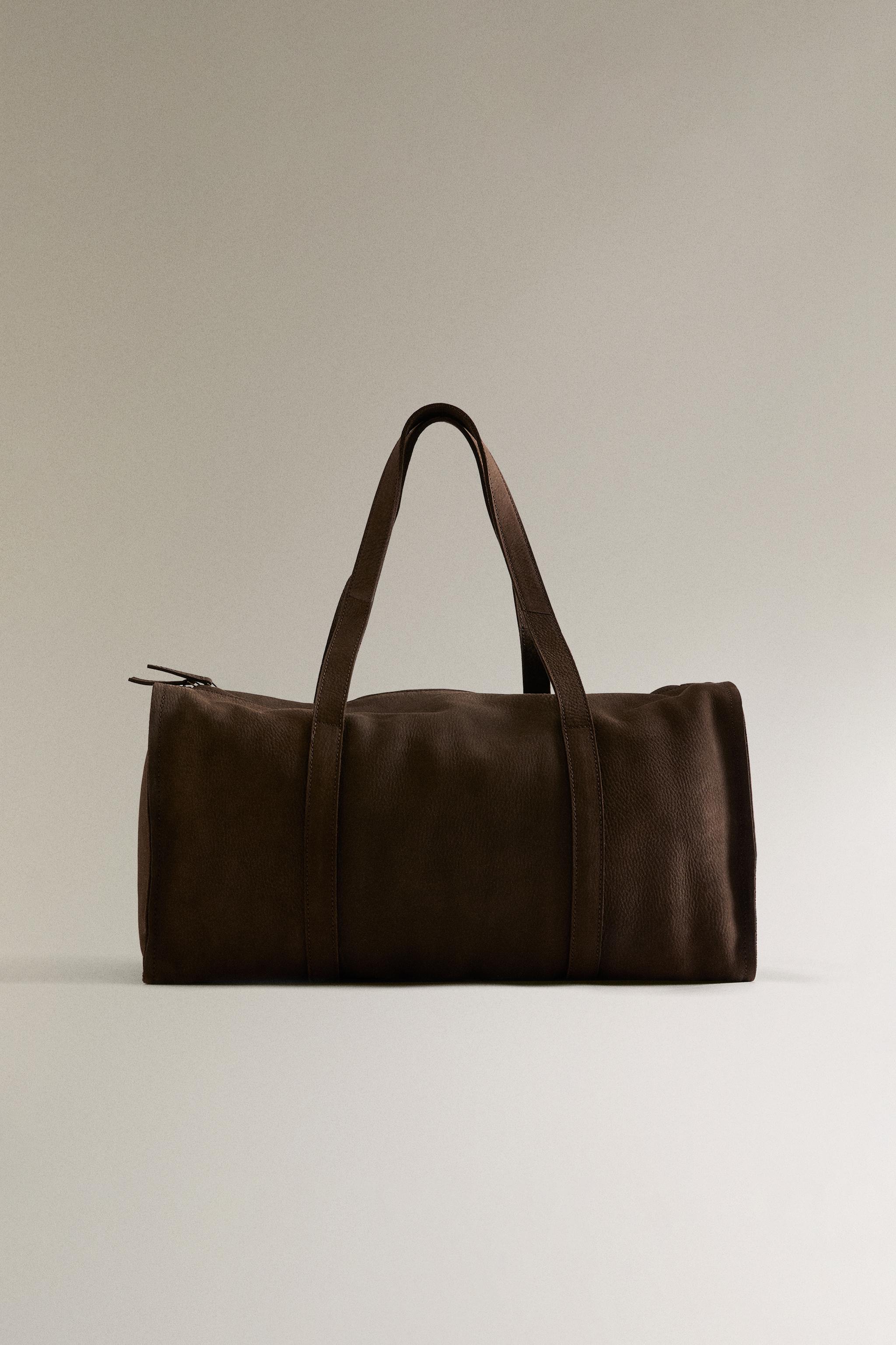 FADED LEATHER TRAVEL BAG