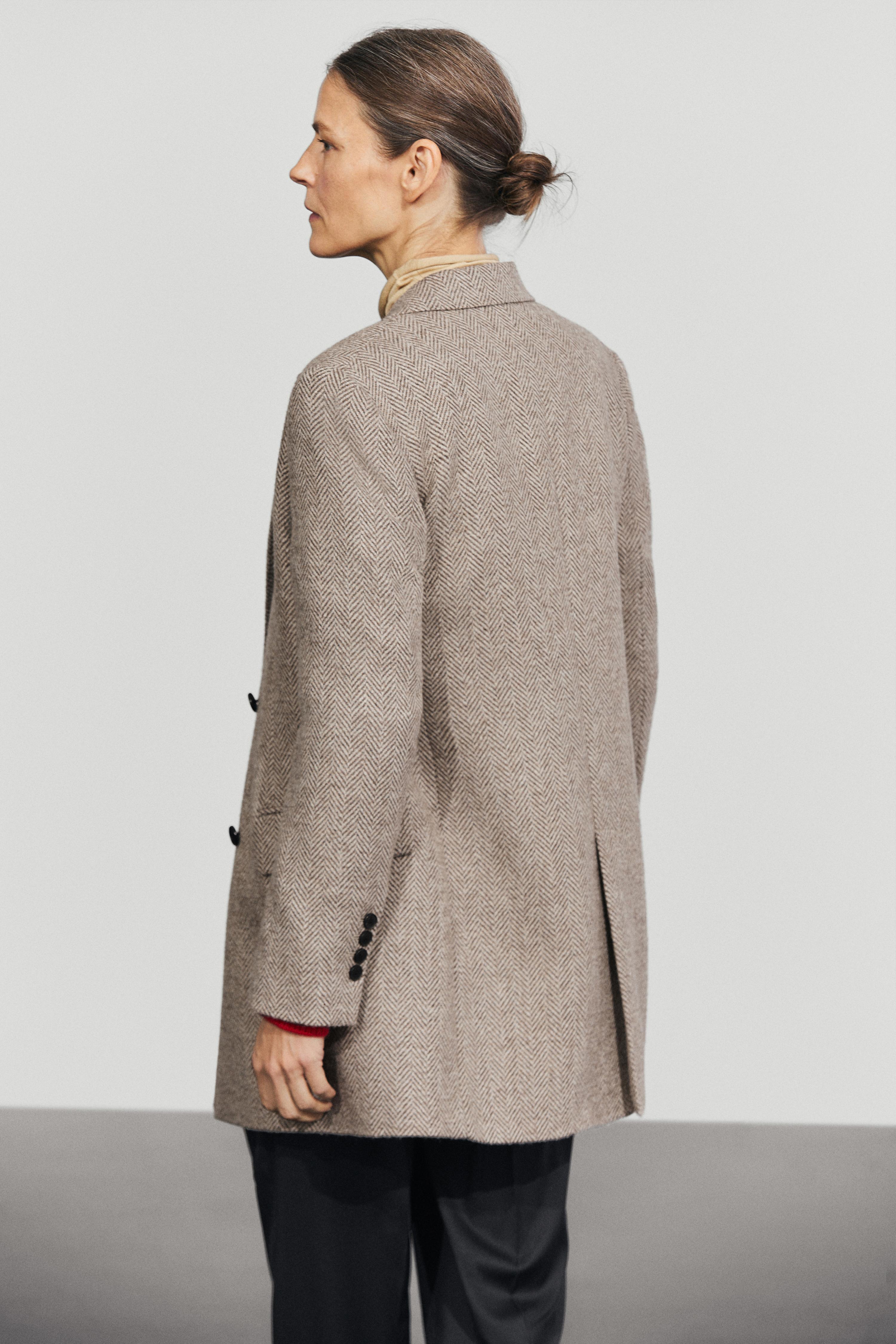 Mid-length double-breasted herringbone coat