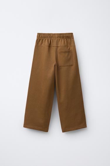 PANTALON EN MOLLETON STRAIGHT ÉTIQUETTE - Ocre de Zara - Image 1