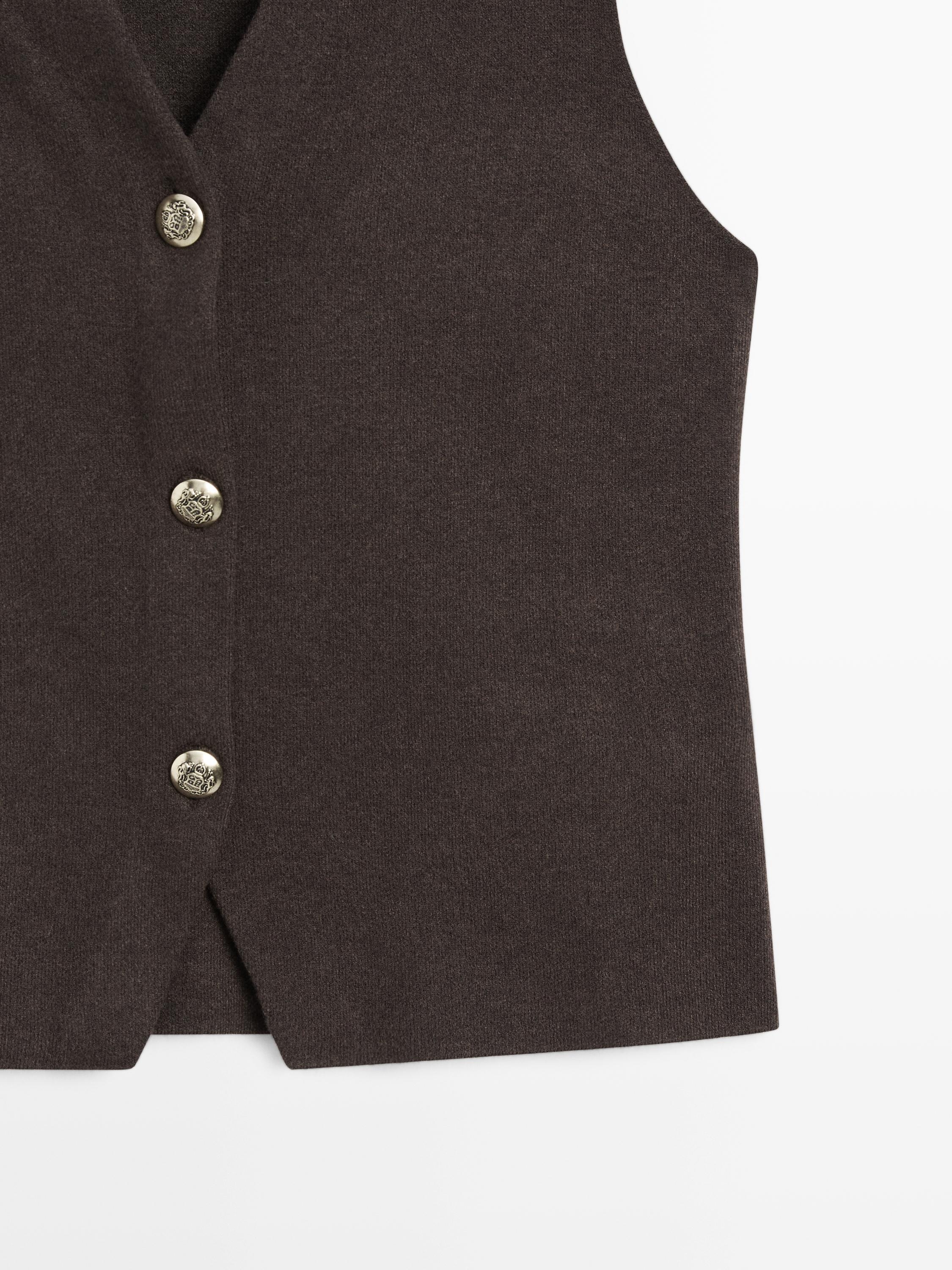Knit vest with golden buttons