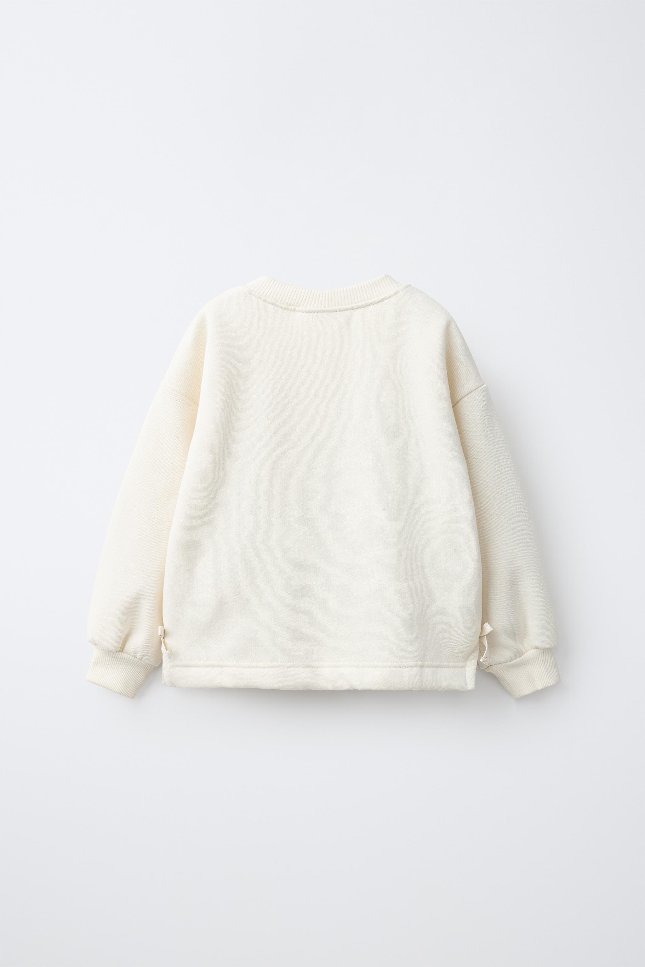 KNIT FLOWER SWEATSHIRT