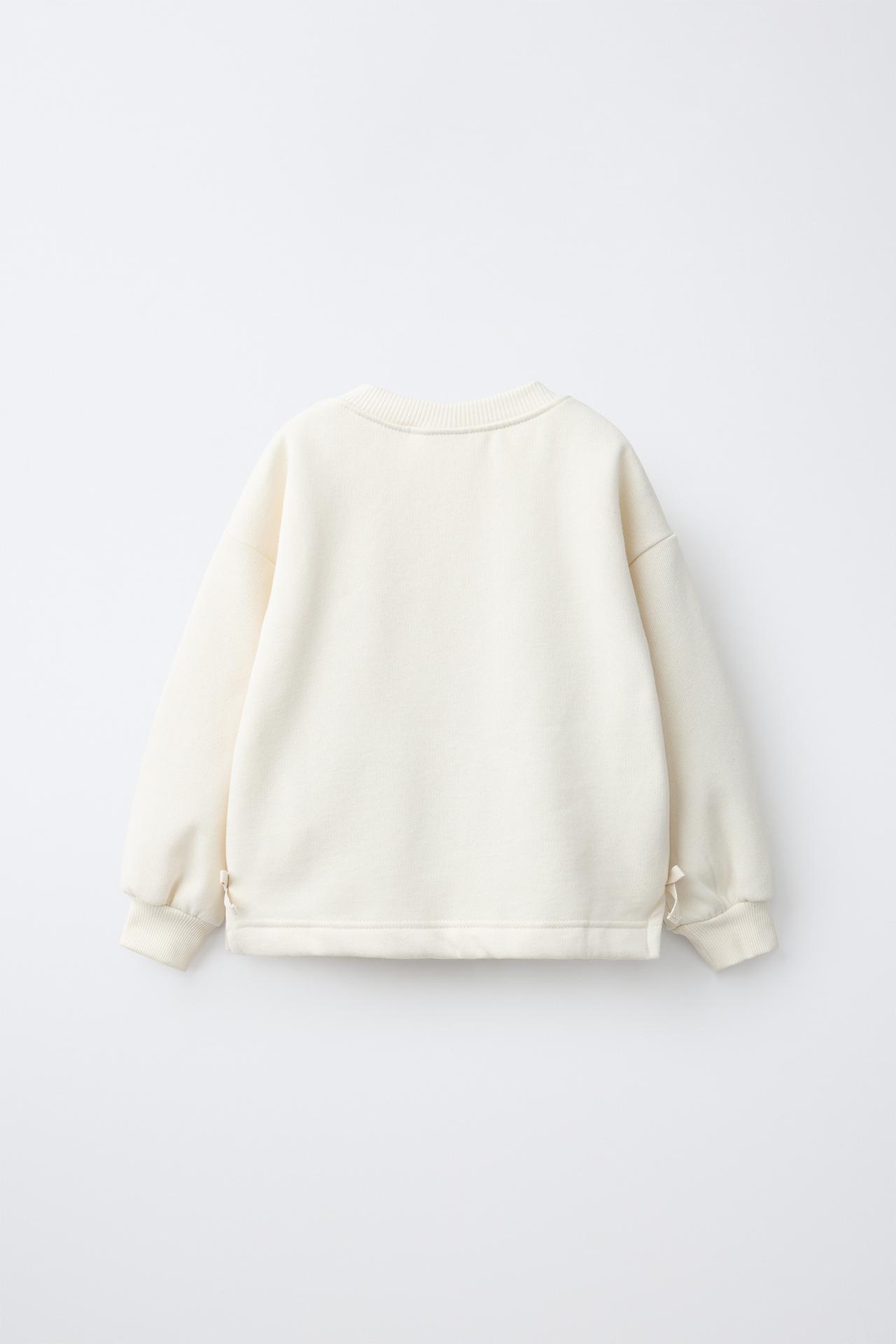 KNIT FLOWER SWEATSHIRT — Ecru