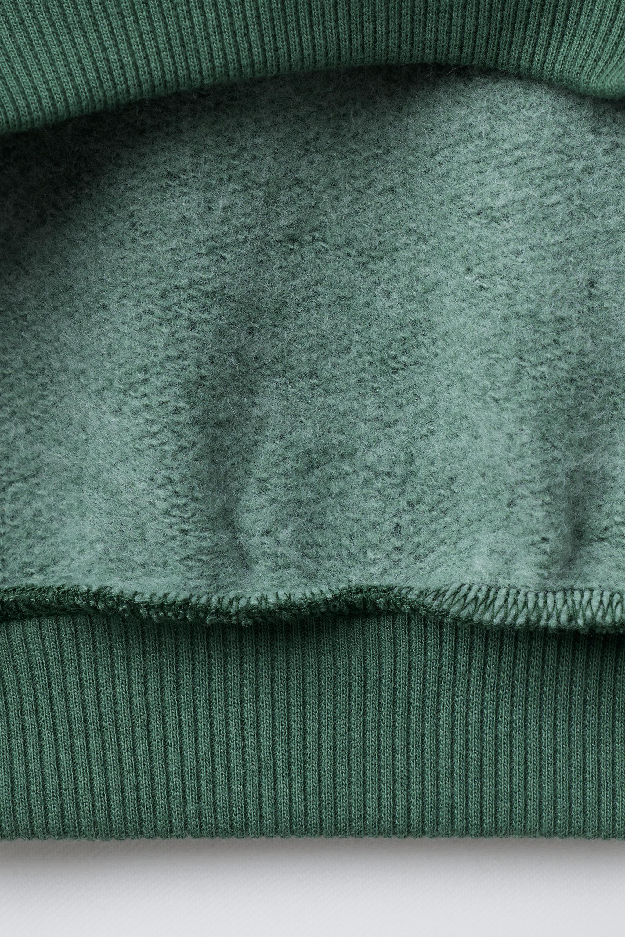 SWEAT AVEC IMPRIMÉ INSCRIPTION