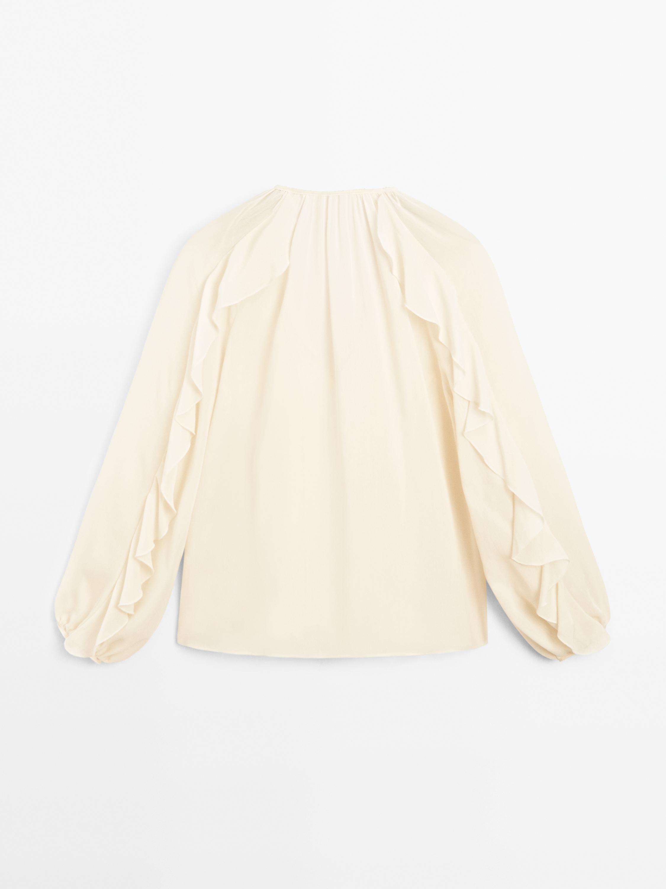 Flowing blouse with ruffles