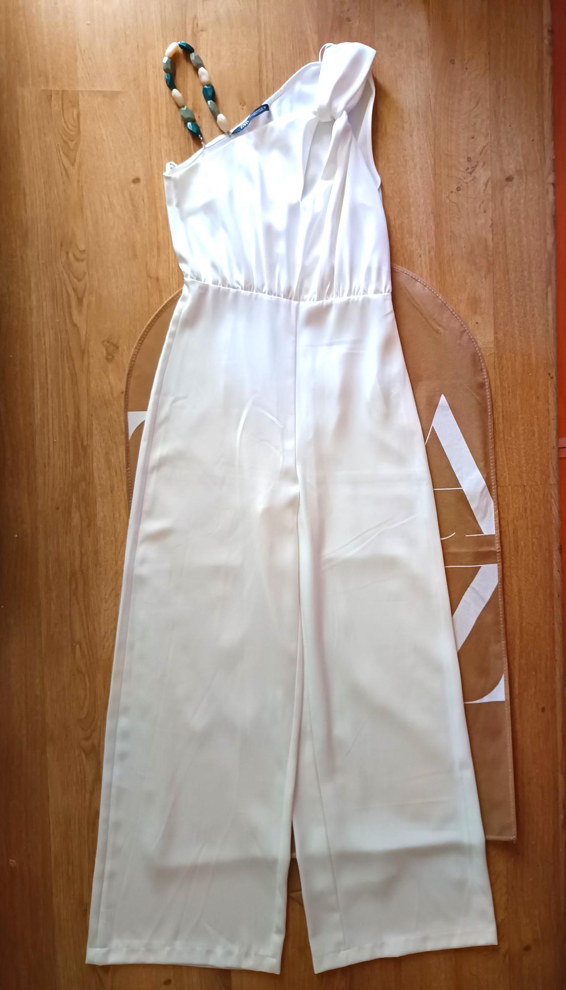 ASYMMETRIC JUMPSUIT WITH STONE STRAP