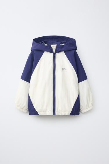 سترة مطر خفيفة COLOR BLOCK WATER REPELLENT - خَام / أزرق by Zara
