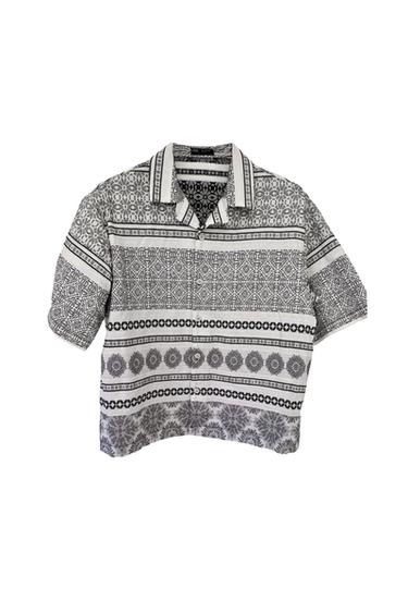Black and white geometric print short-sleeved shirt, with a classic collar and front buttons.