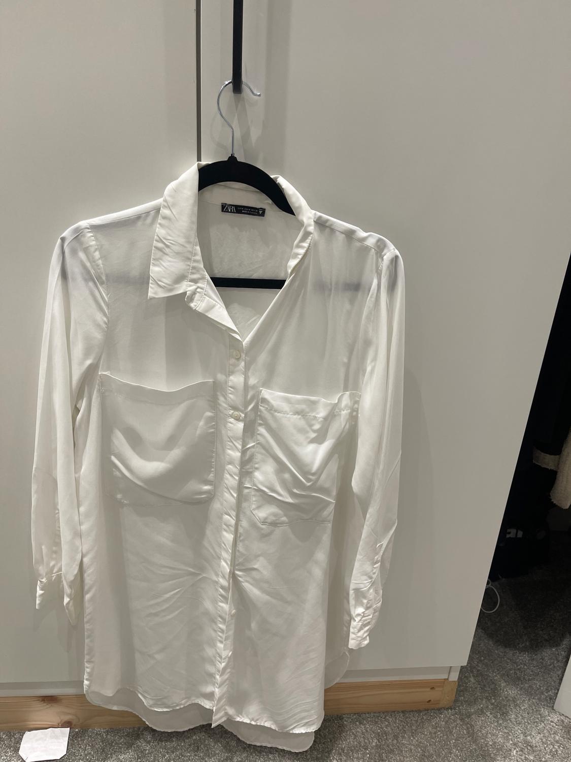 ASYMMETRIC SHIRT WITH POCKETS