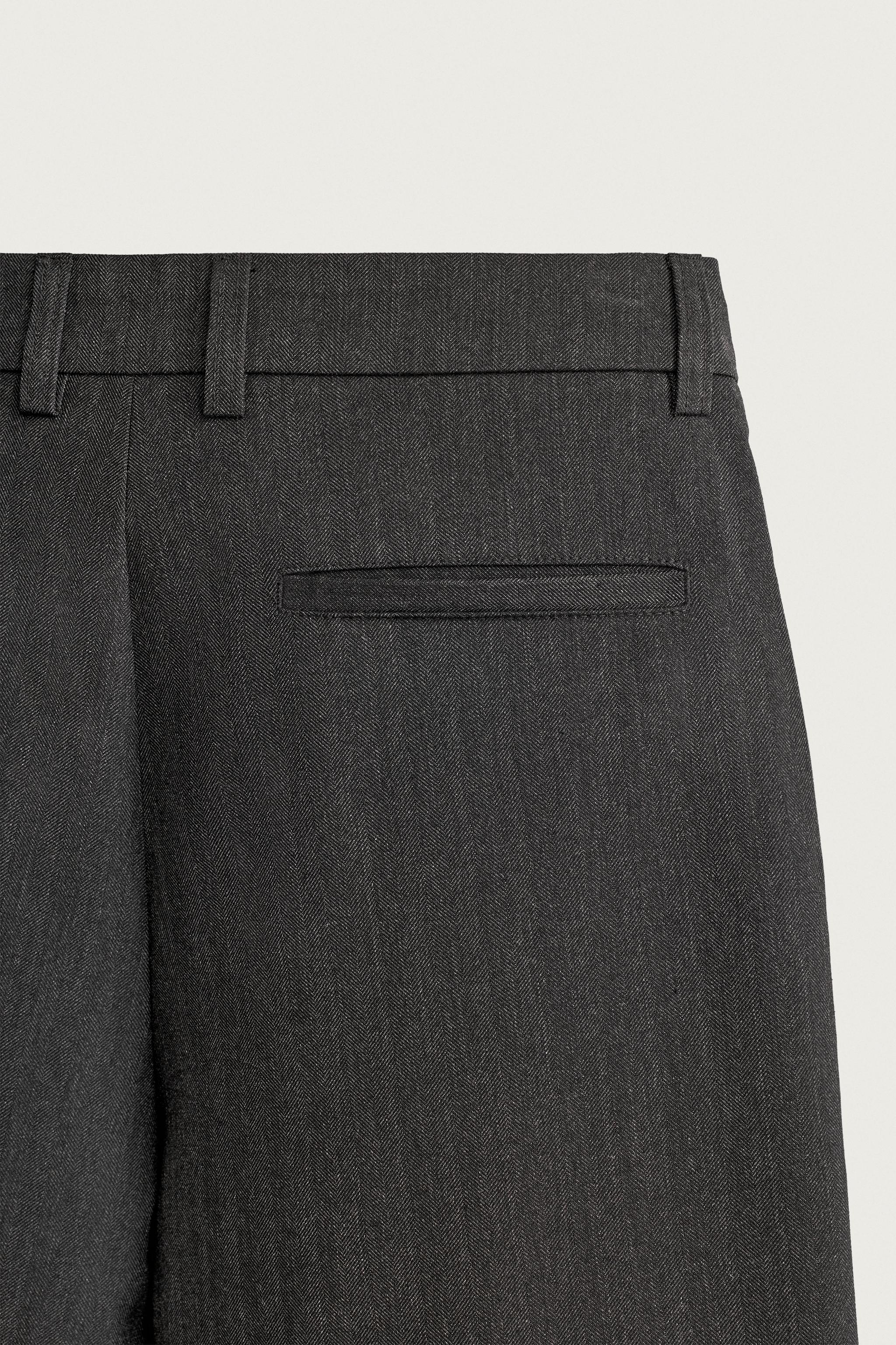 PLEATED RELAXED-FIT PANTS