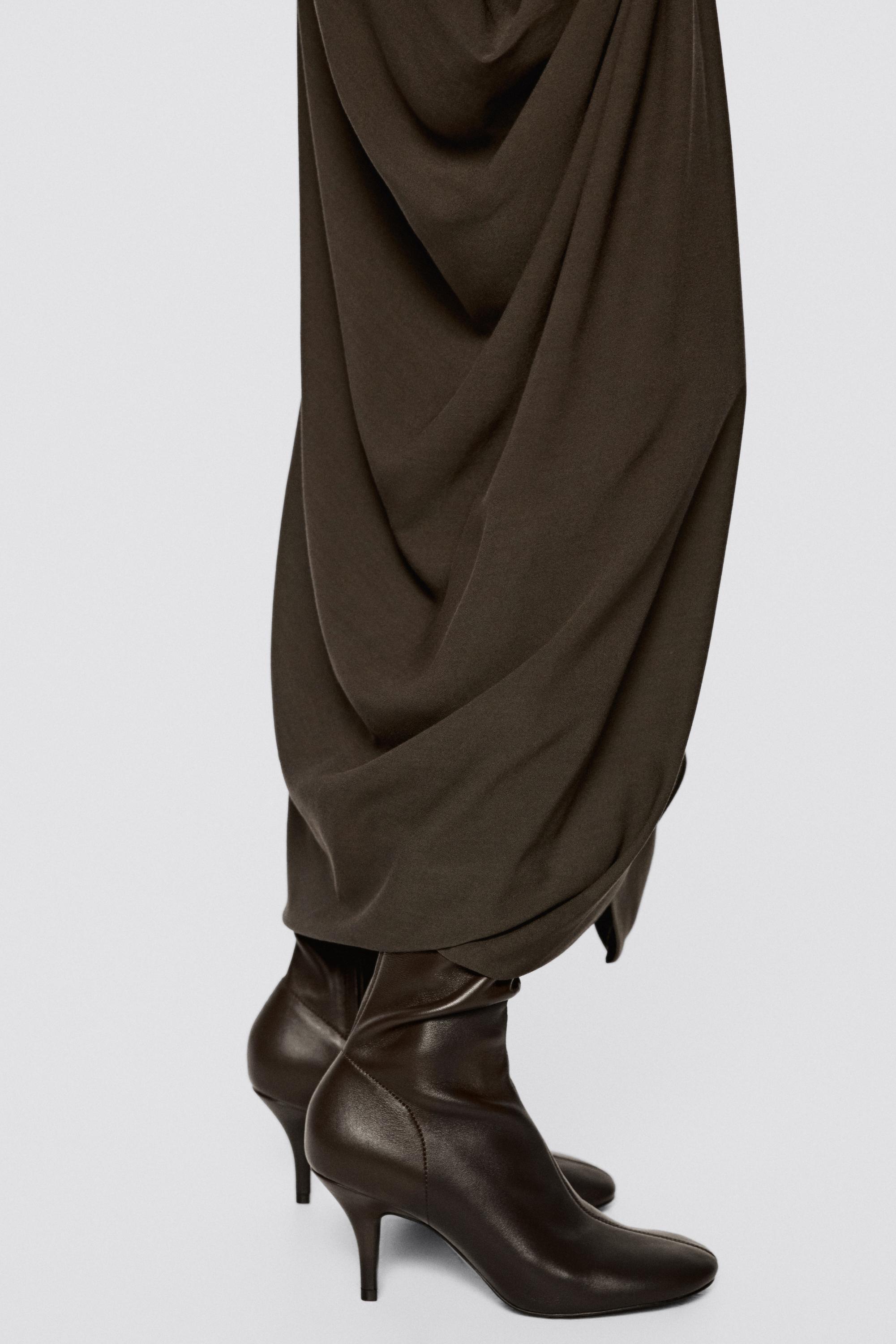 Elastic leather heeled boot - LIMITED EDITION