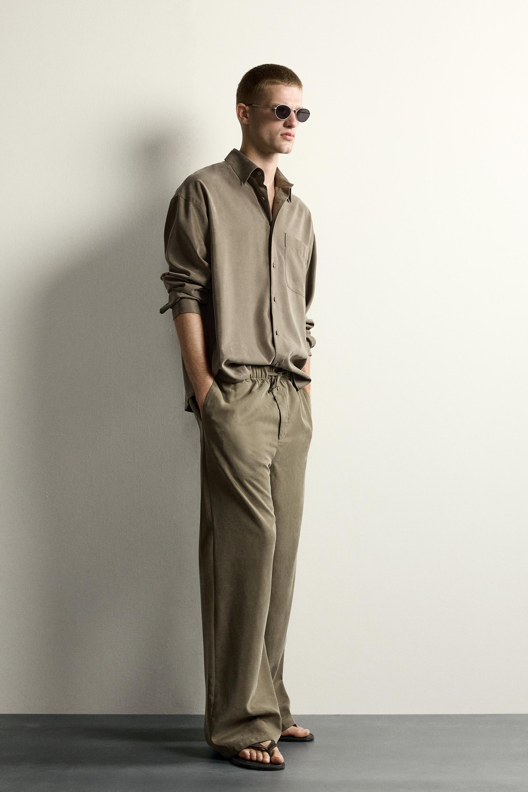 RELAXED FIT FLOWY PANTS