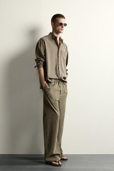 RELAXED FIT FLOWING TROUSERS - Brown by Zara