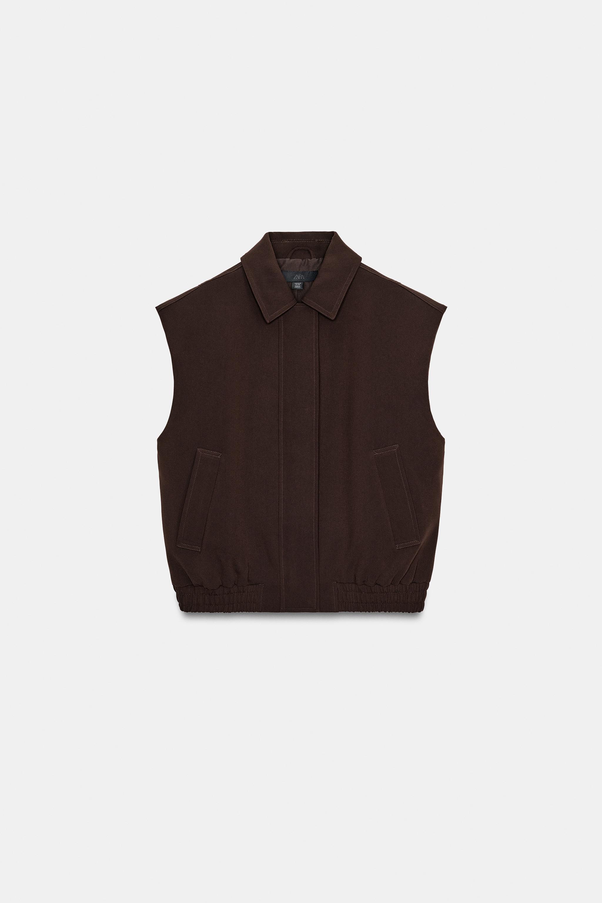 GILET À ÉPAULETTES AVEC BAS ÉLASTIQUE