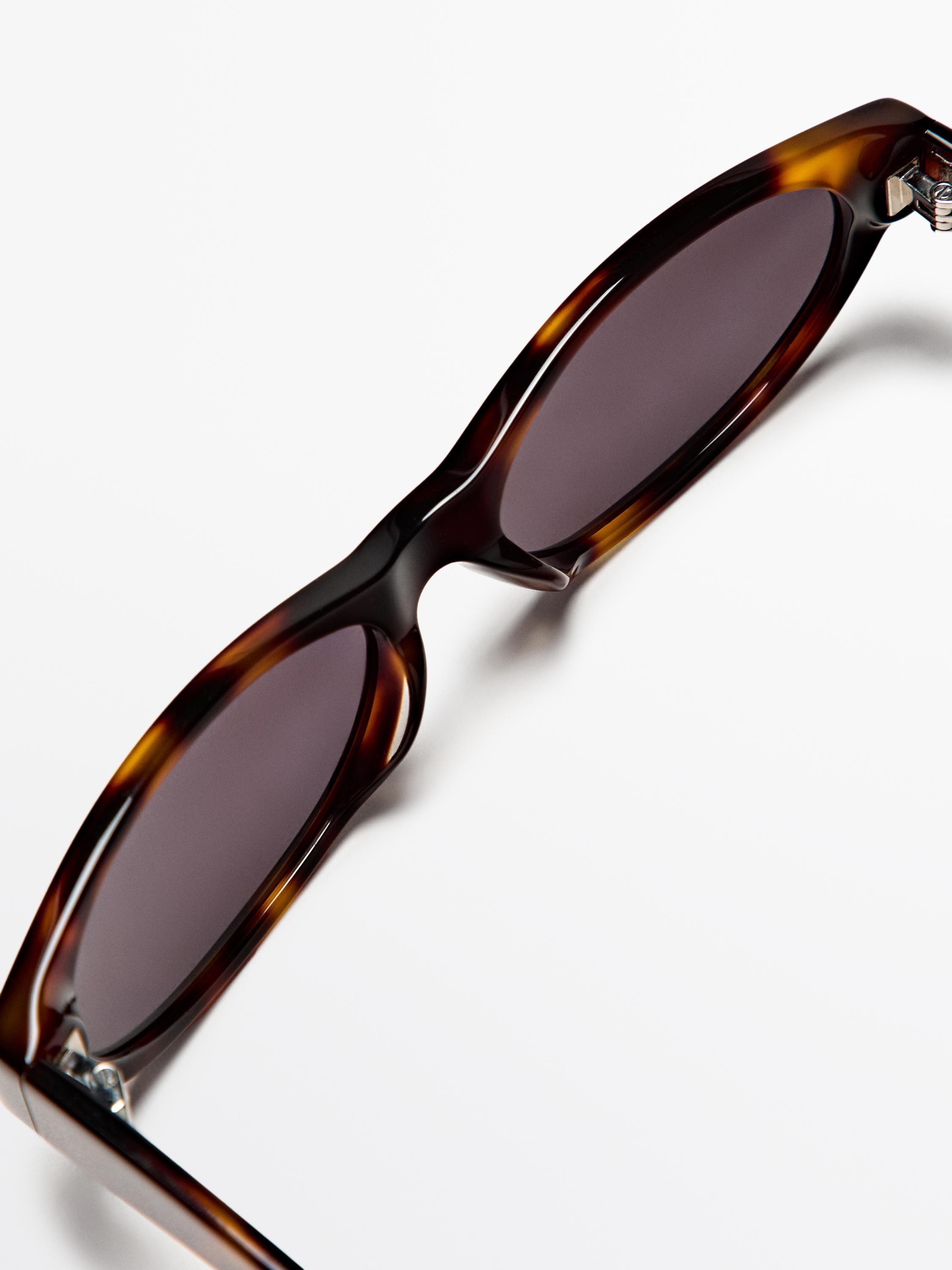 Narrow tortoiseshell-effect sunglasses