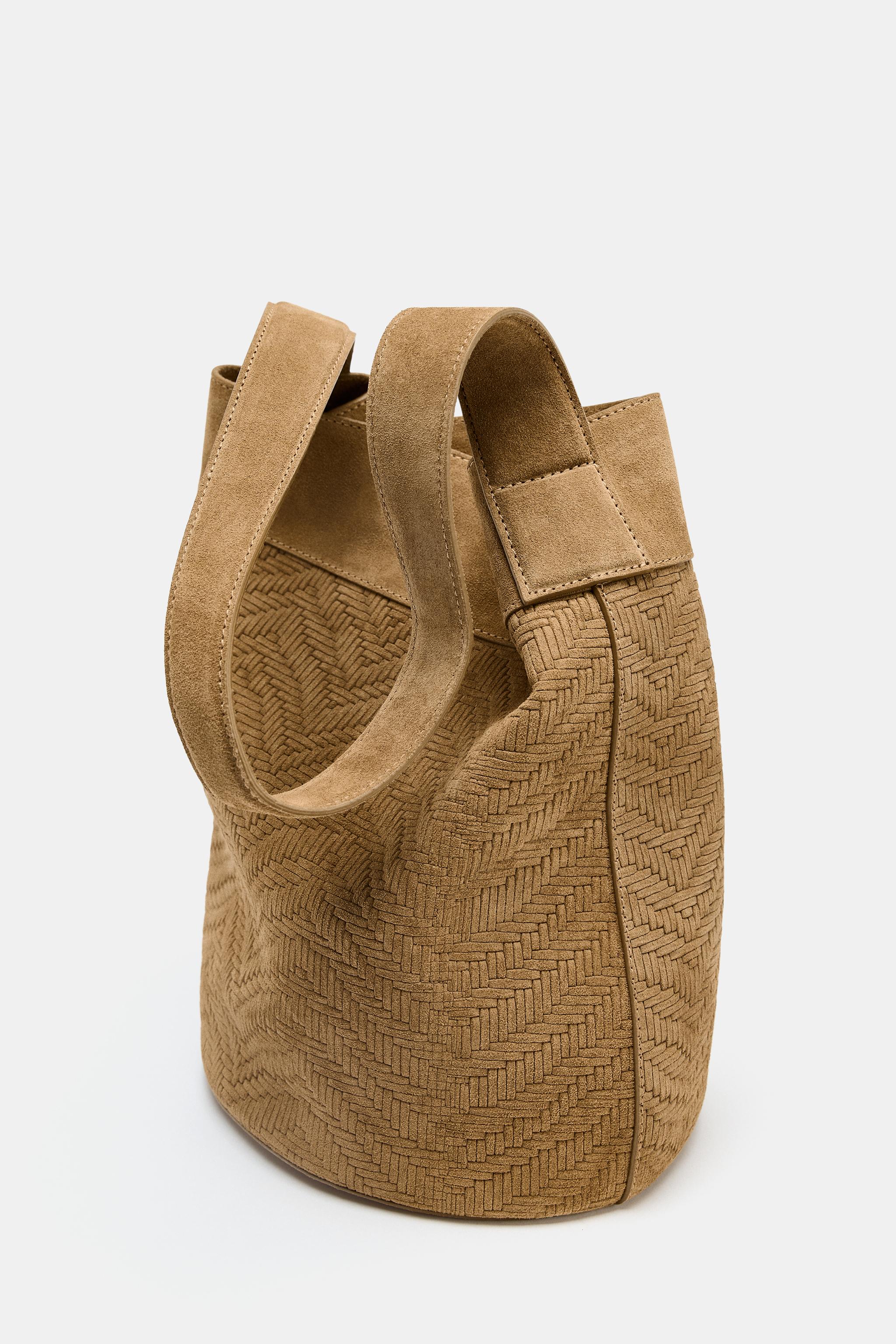 SAC MAXI SEAU EN CROÛTE DE CUIR TRESSÉE