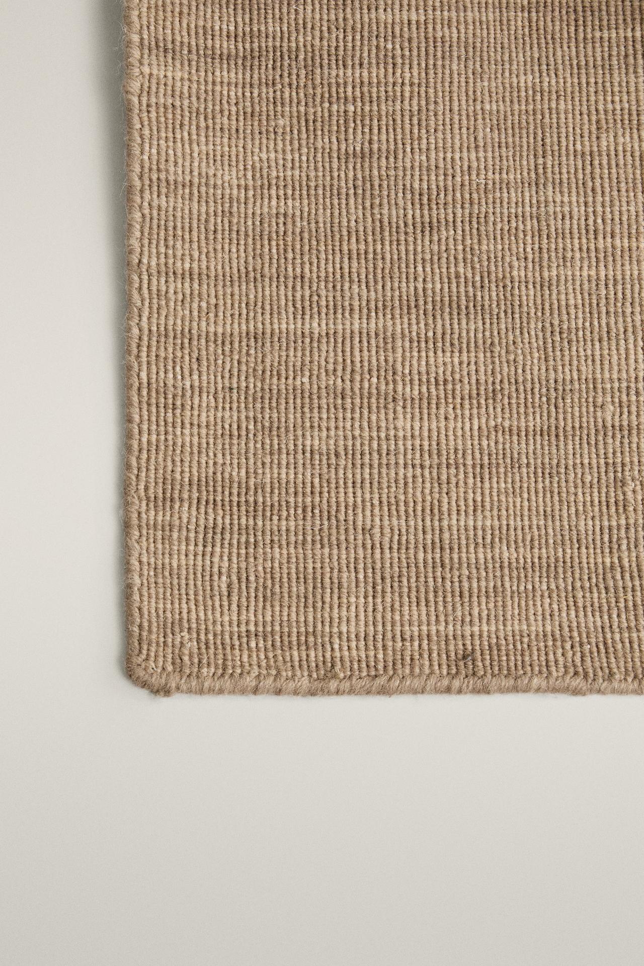 COTTON AND WOOL KNOTTED AREA RUG — Beige