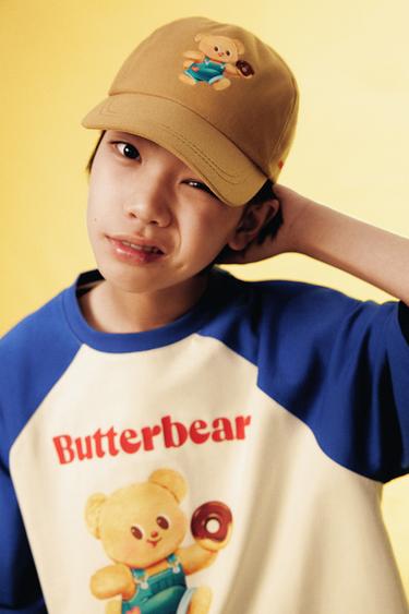 BUTTERBEAR © PRINT CAP - Brown by Zara