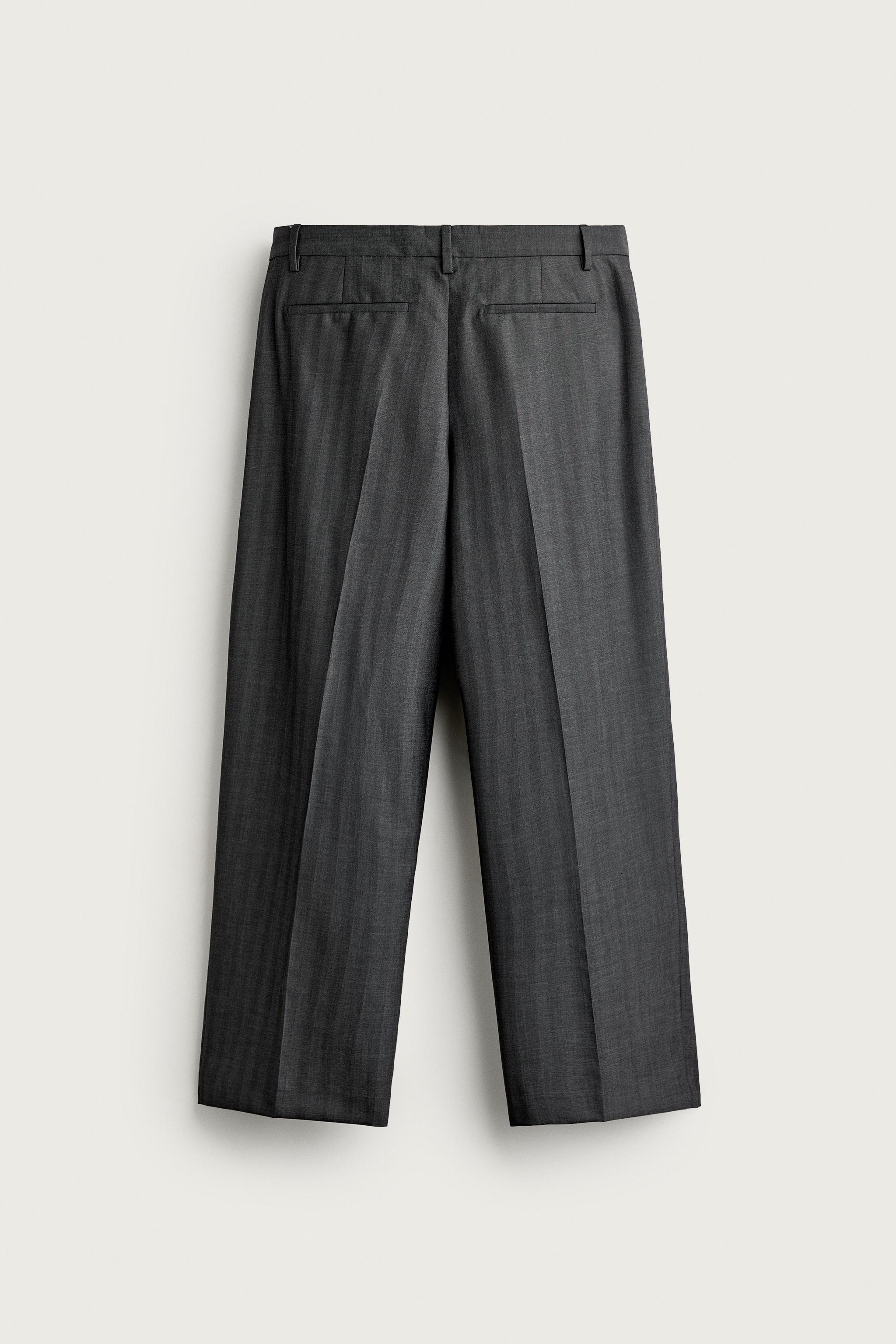 STRIPED PLEATED RELAXED FIT PANTS