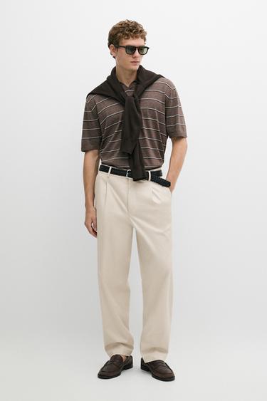 Pantalon relaxed fit à pinces - Beige de Zara