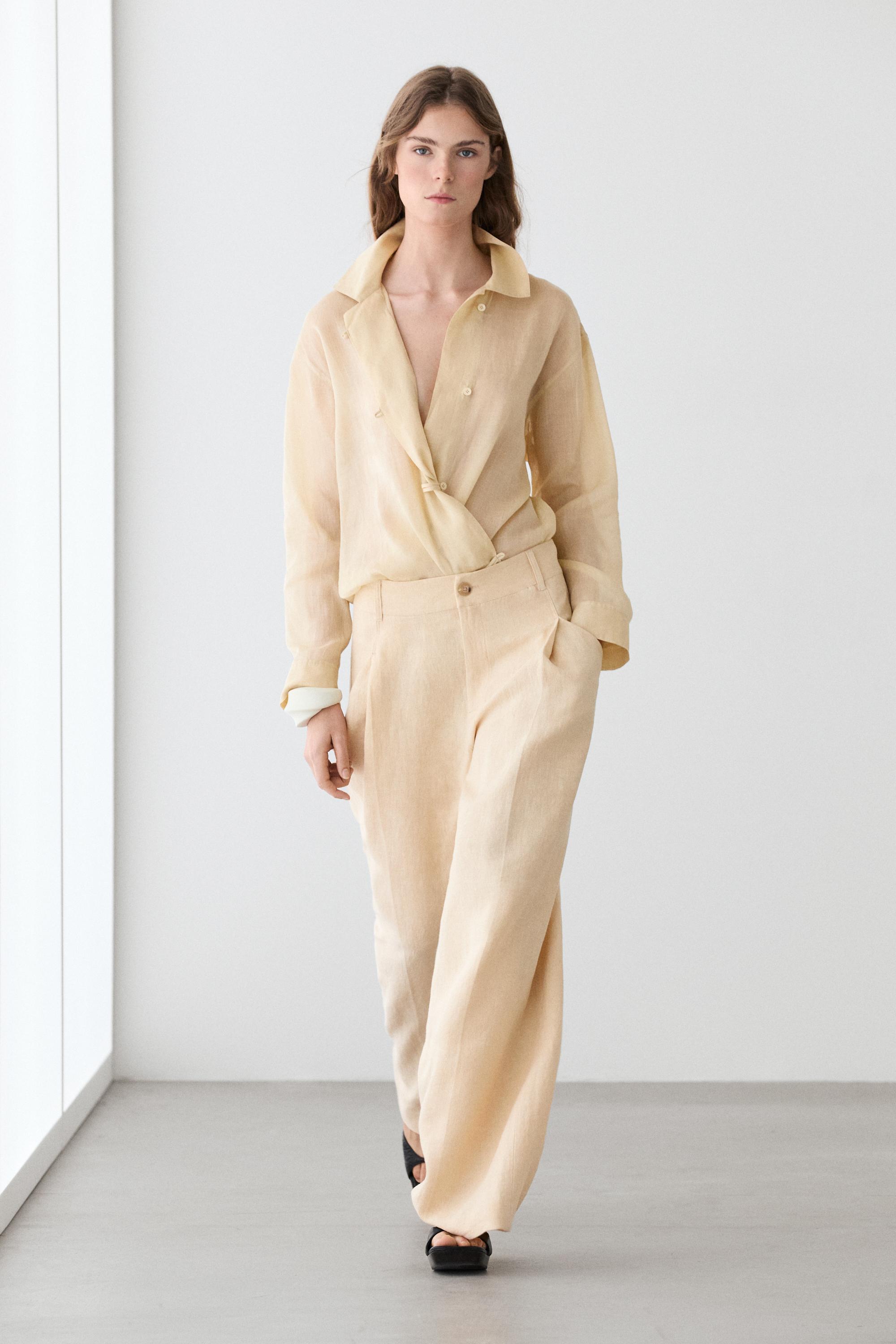 Wide-leg linen trousers with pocket detail — Sand