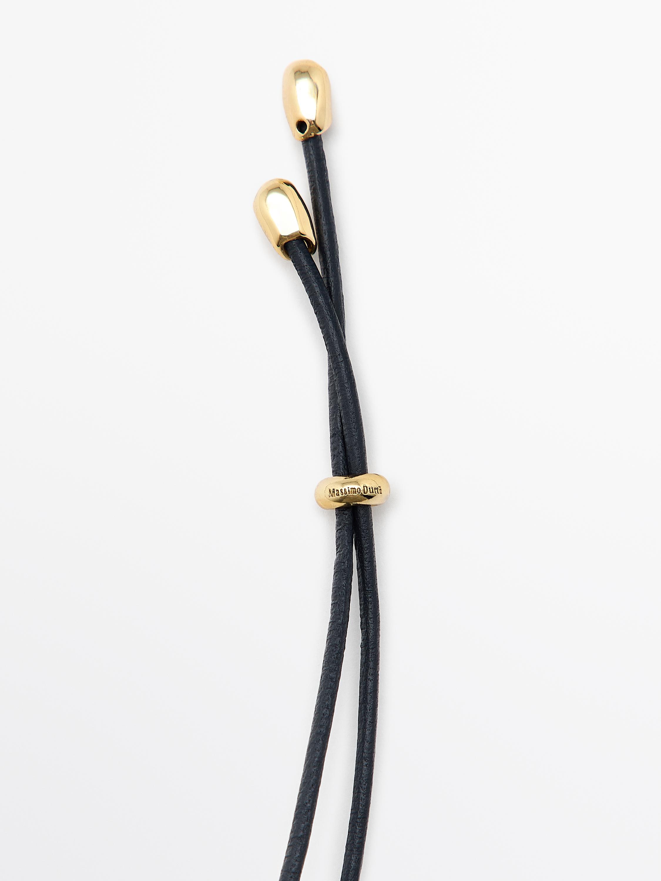 Leather necklace with irregular piece