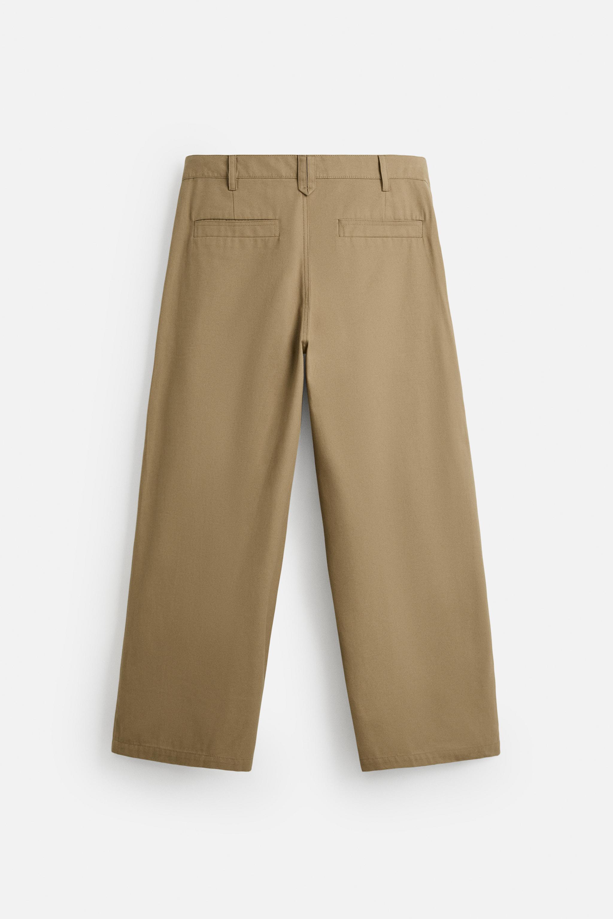 PLEATED WIDE FIT PANTS