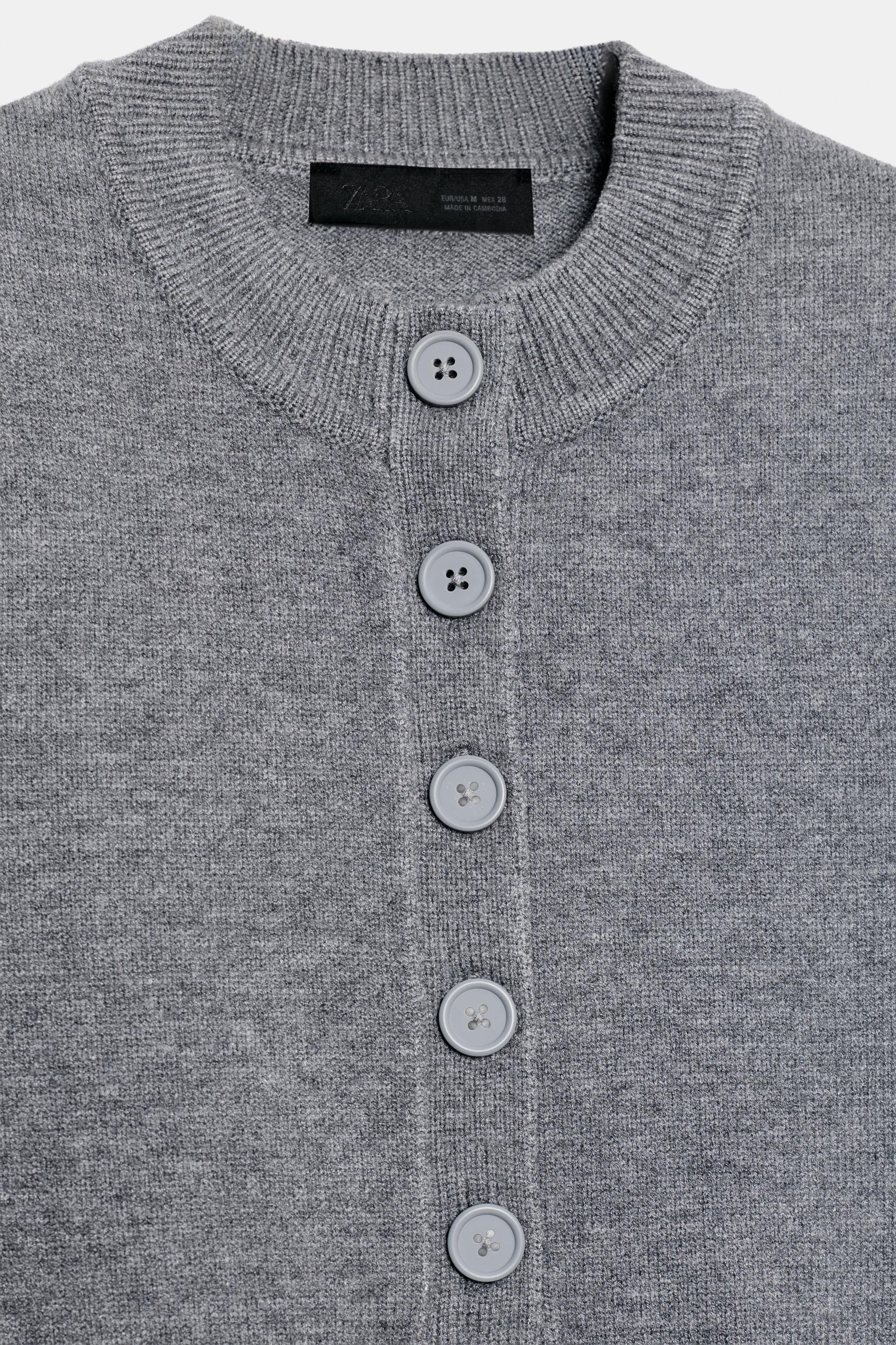 TOP EN MAILLE À MANCHES COURTES BOUTONS