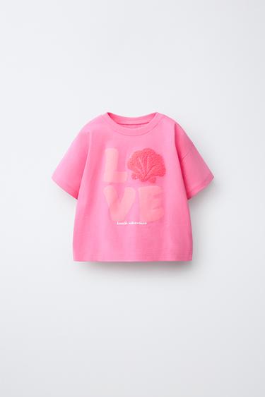 CAMISETA PARCHE RIZO CONCHA - Rosa flúor de Zara