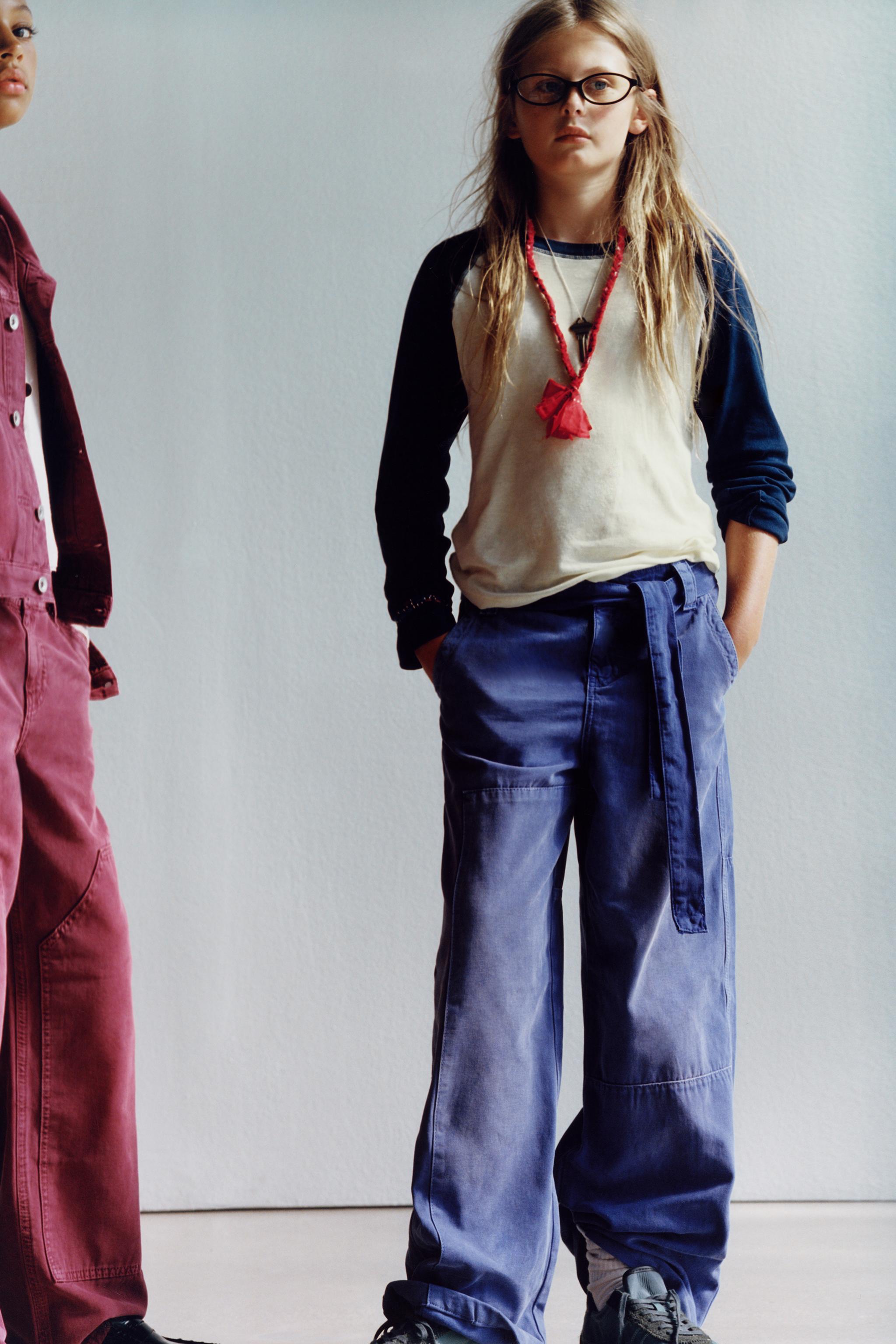 PANTALON EFFET DÉLAVÉ AVEC CEINTURE