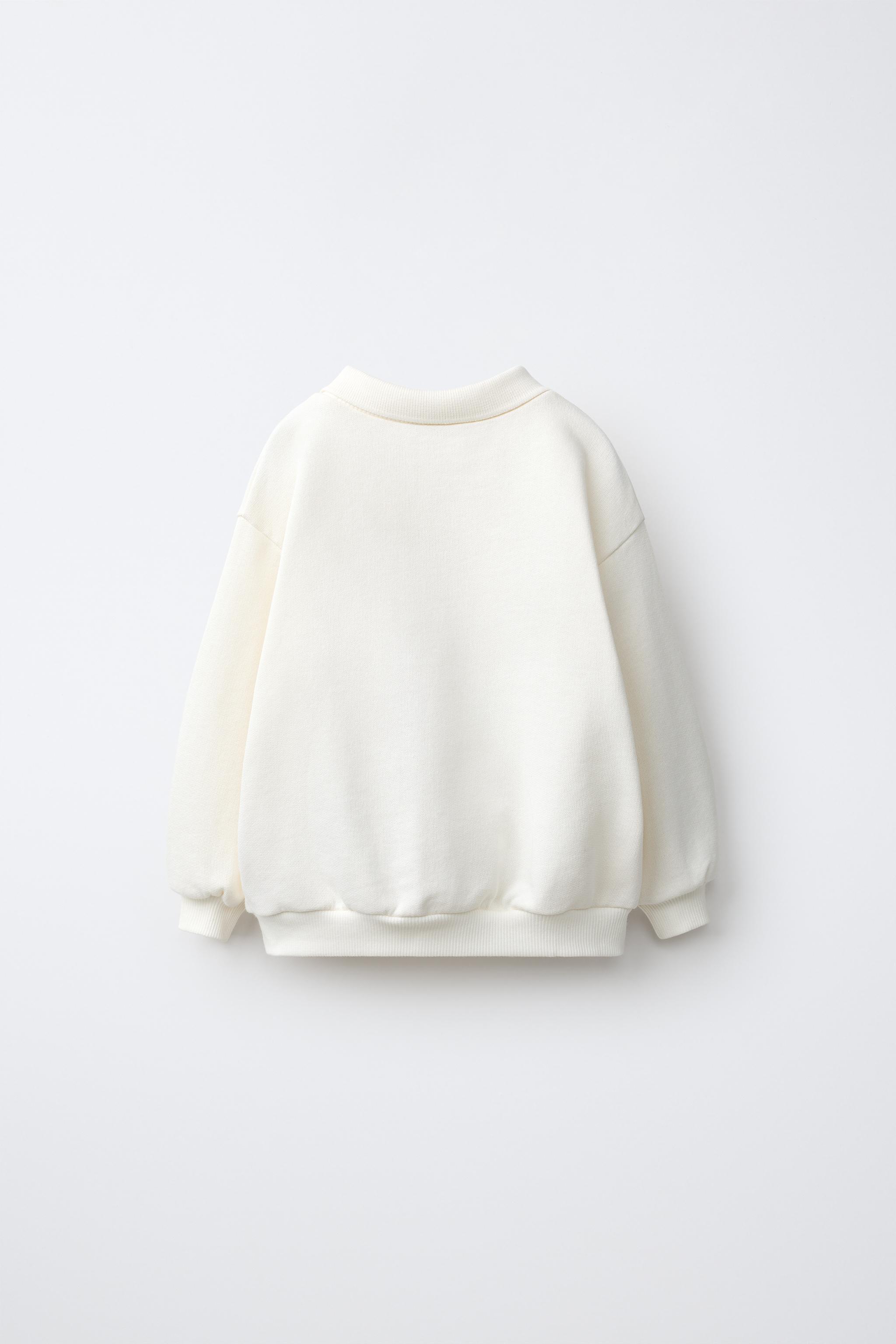 HELLO KITTY © SANRIO POLO SWEATSHIRT — White