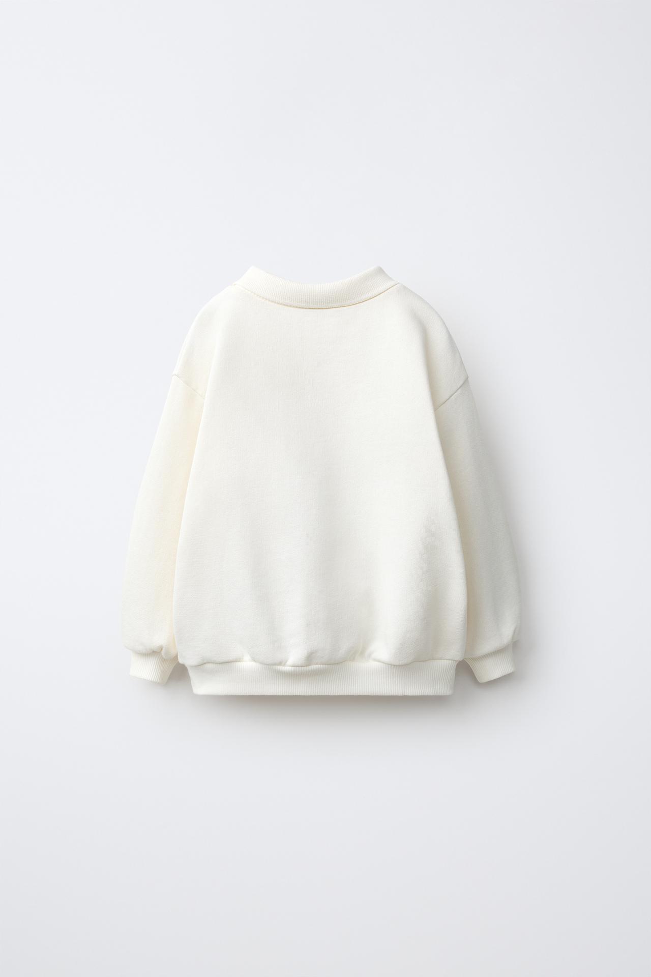 HELLO KITTY © SANRIO POLO SWEATSHIRT — White