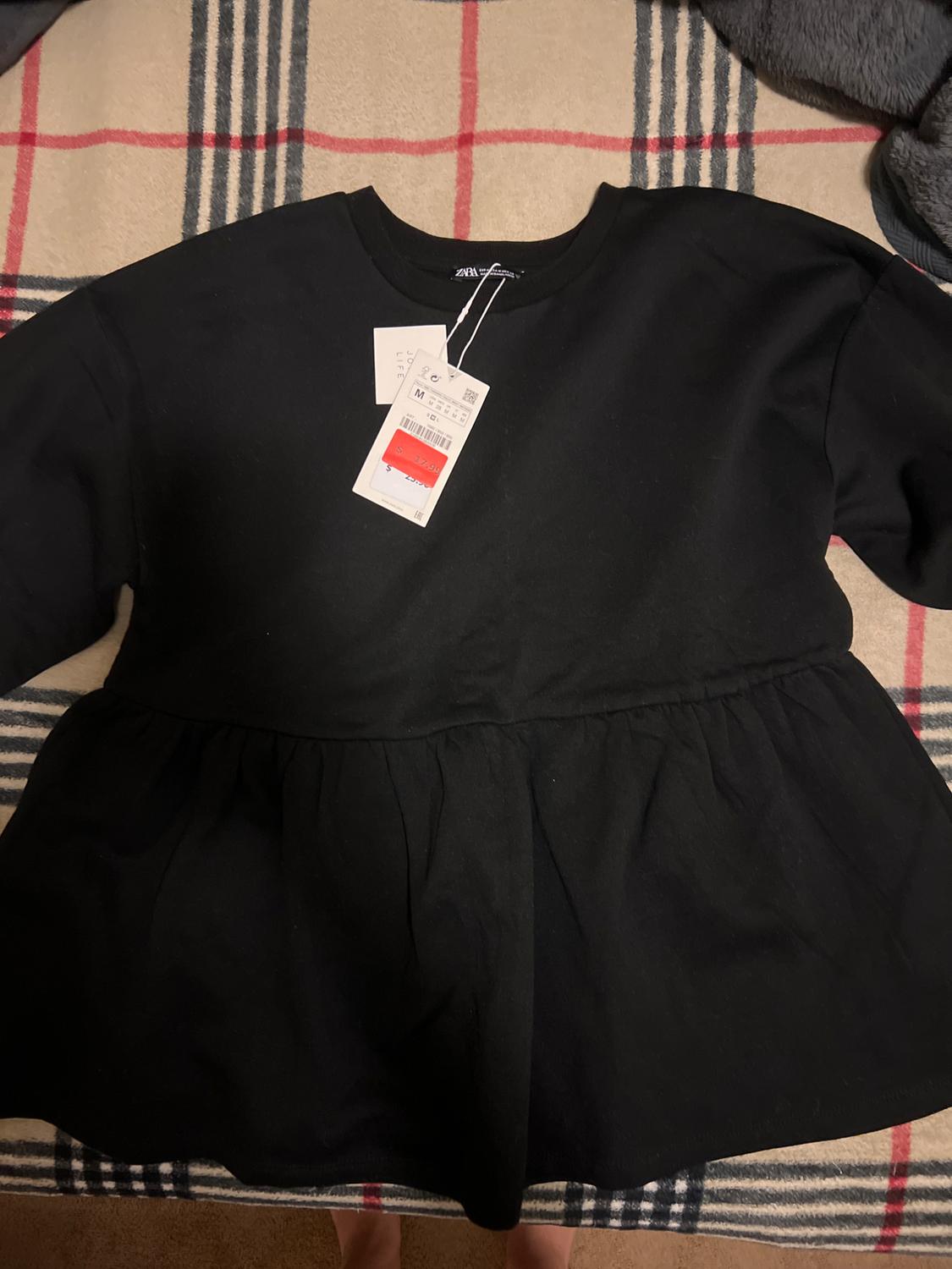PEPLUM SWEATSHIRT