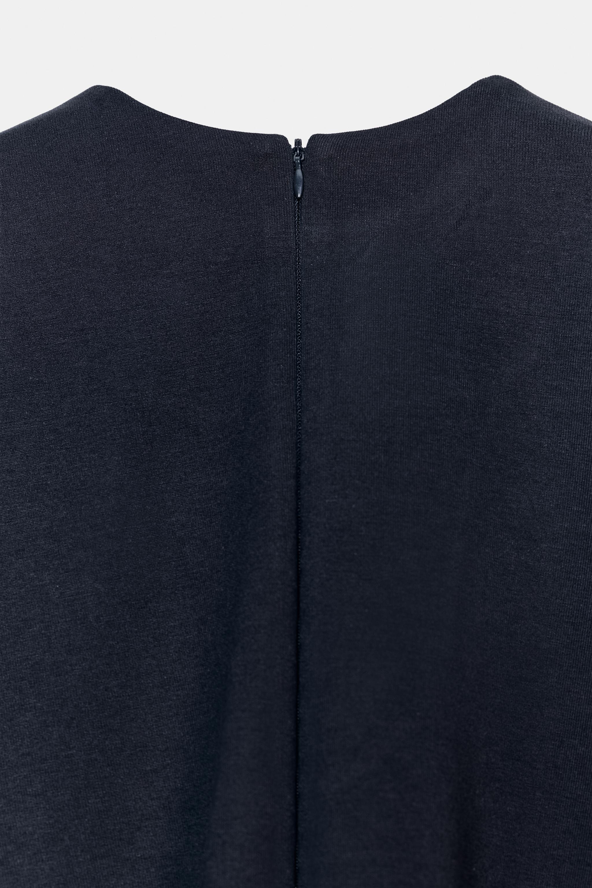 CAPE ASYMÉTRIQUE INTERLOCK