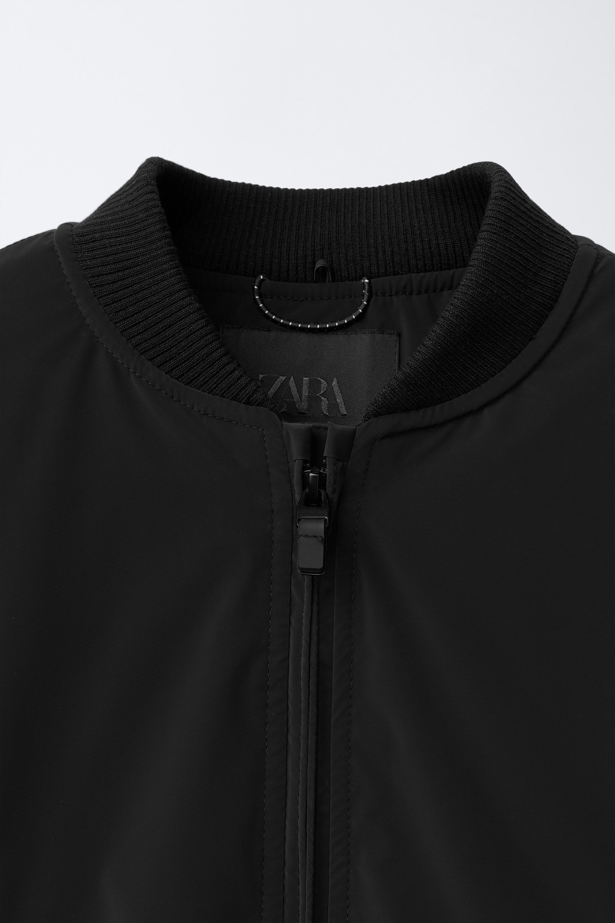 RUBBERIZED BOMBER JACKET WITH REMOVABLE FLEECE HOODIE