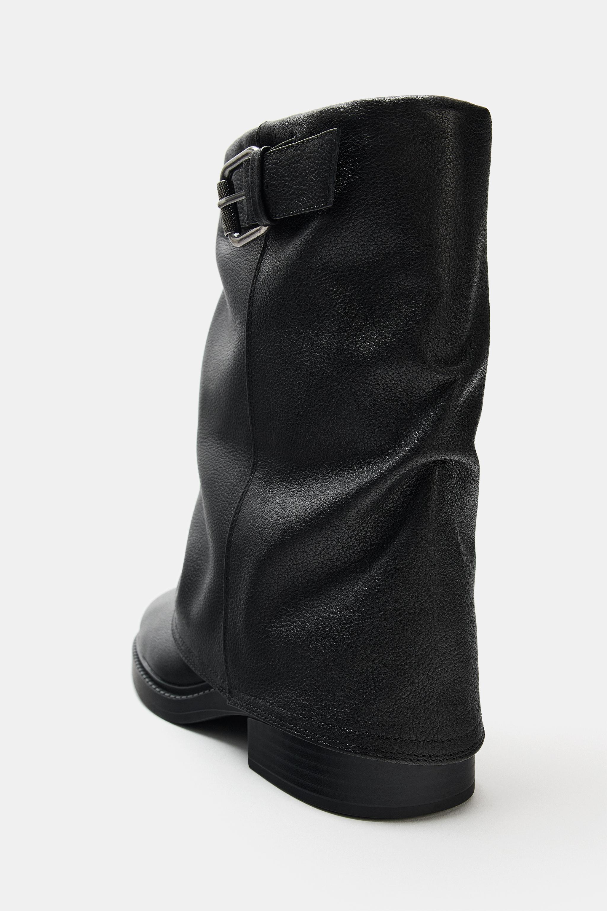 BOTTINES EN CUIR À BOUCLE