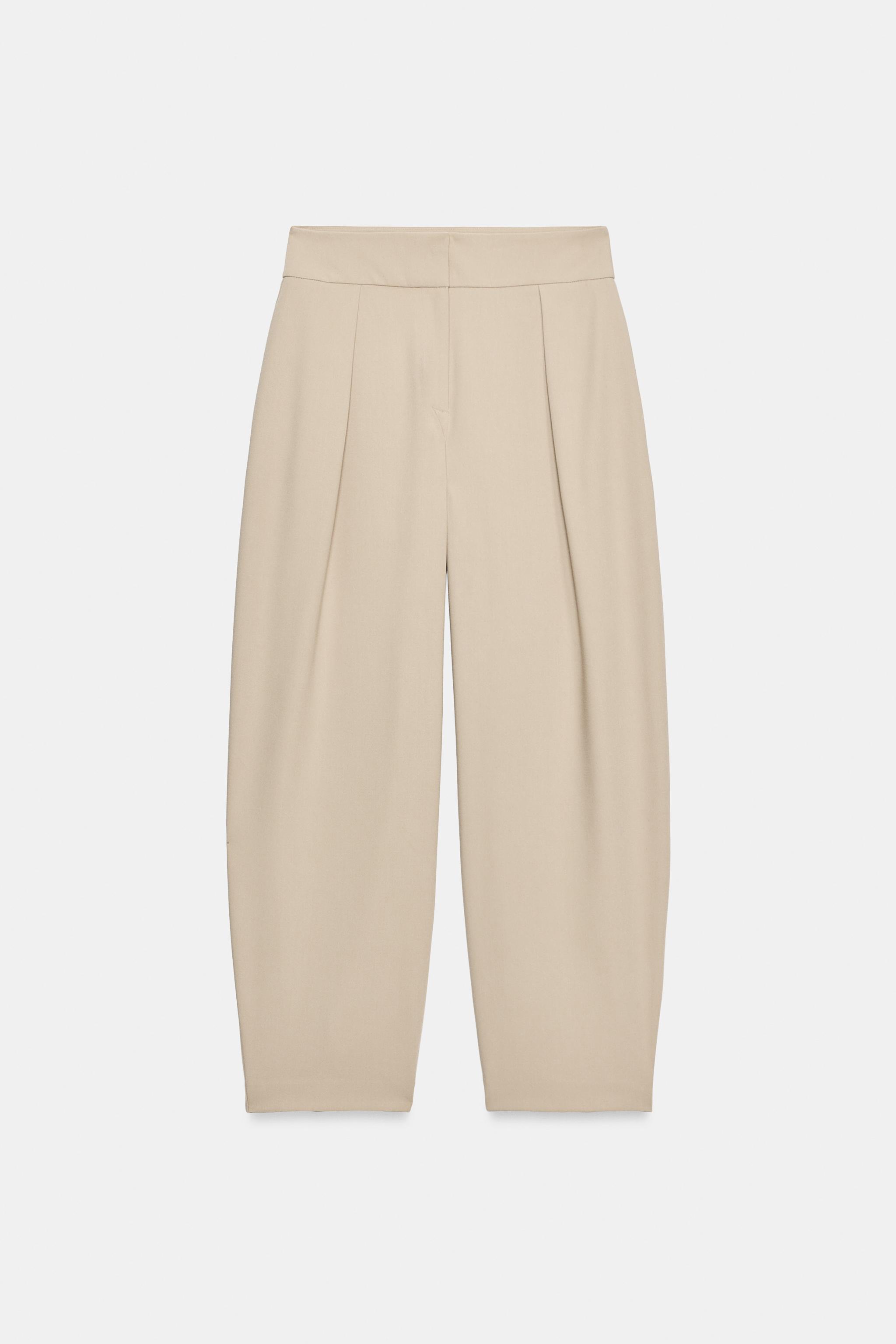 PLEATED CARROT TROUSERS