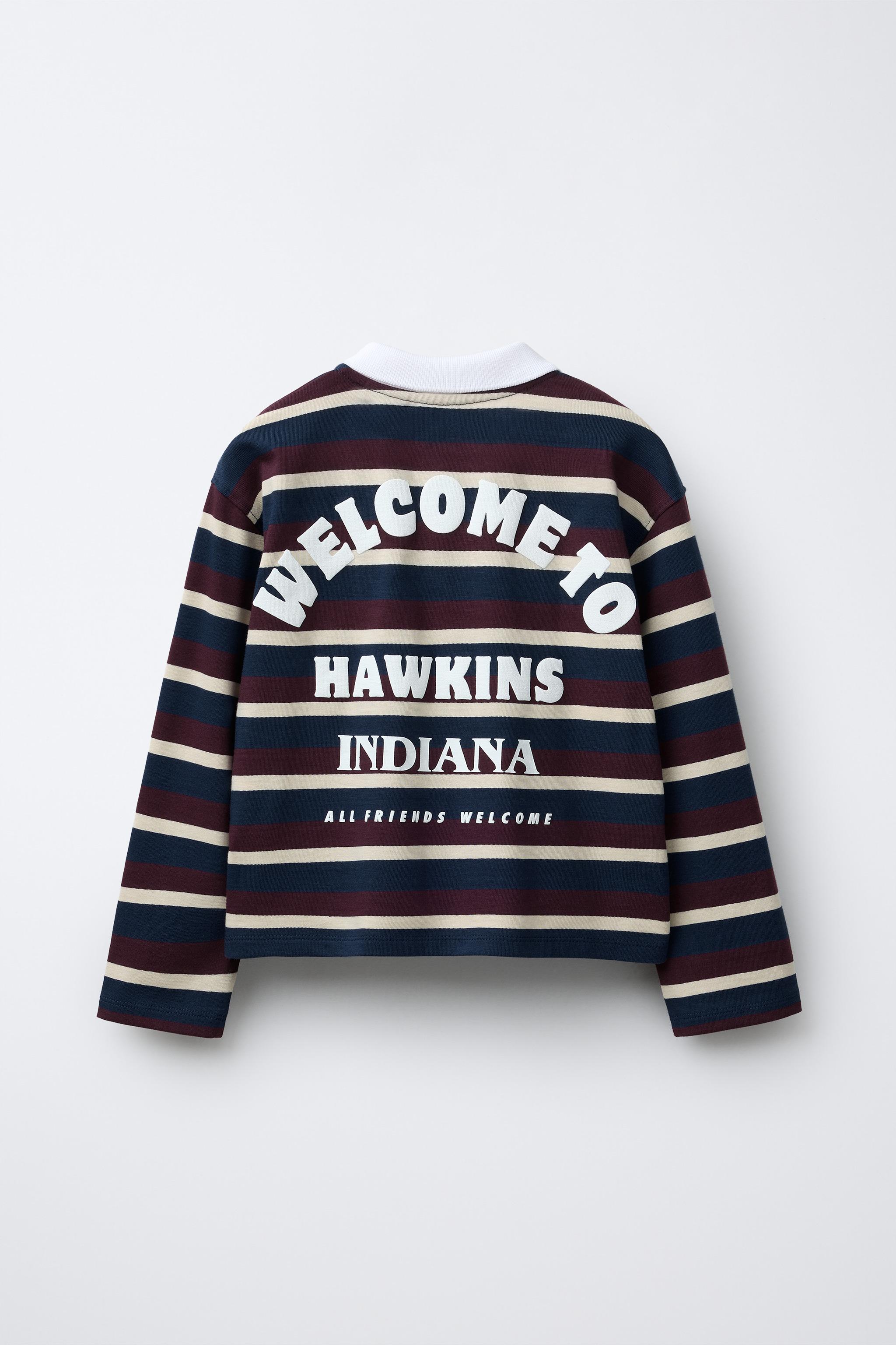 STRIPED STRANGER THINGS © NETFLIX POLO SHIRT