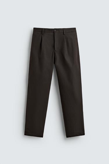 TEXTURED PLEATED TROUSERS - Brown by Zara