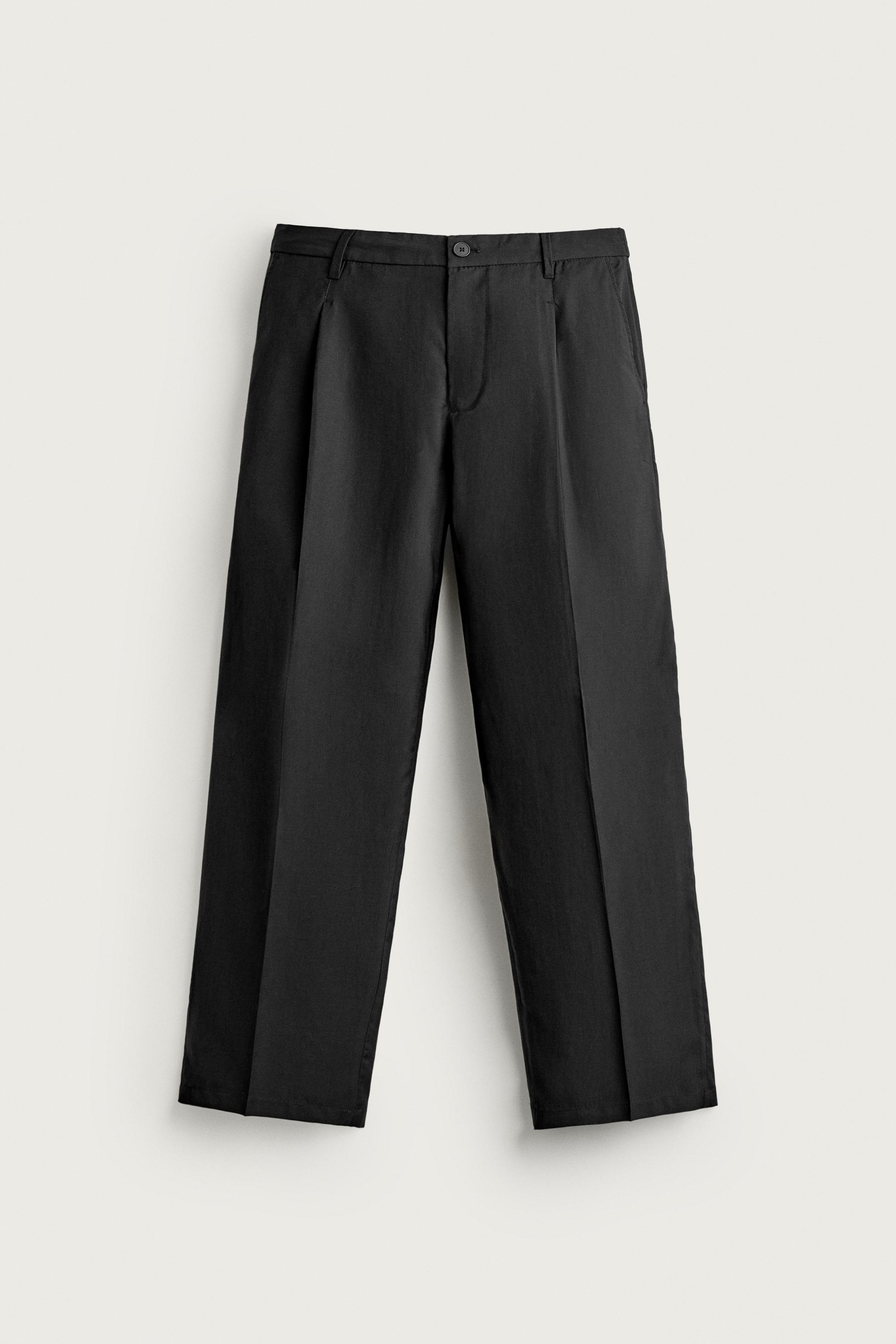 PLEATED FLUID PANTS — Black