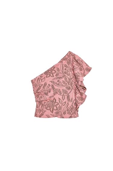 Front view of pink top with floral print and frill detail on the shoulder.