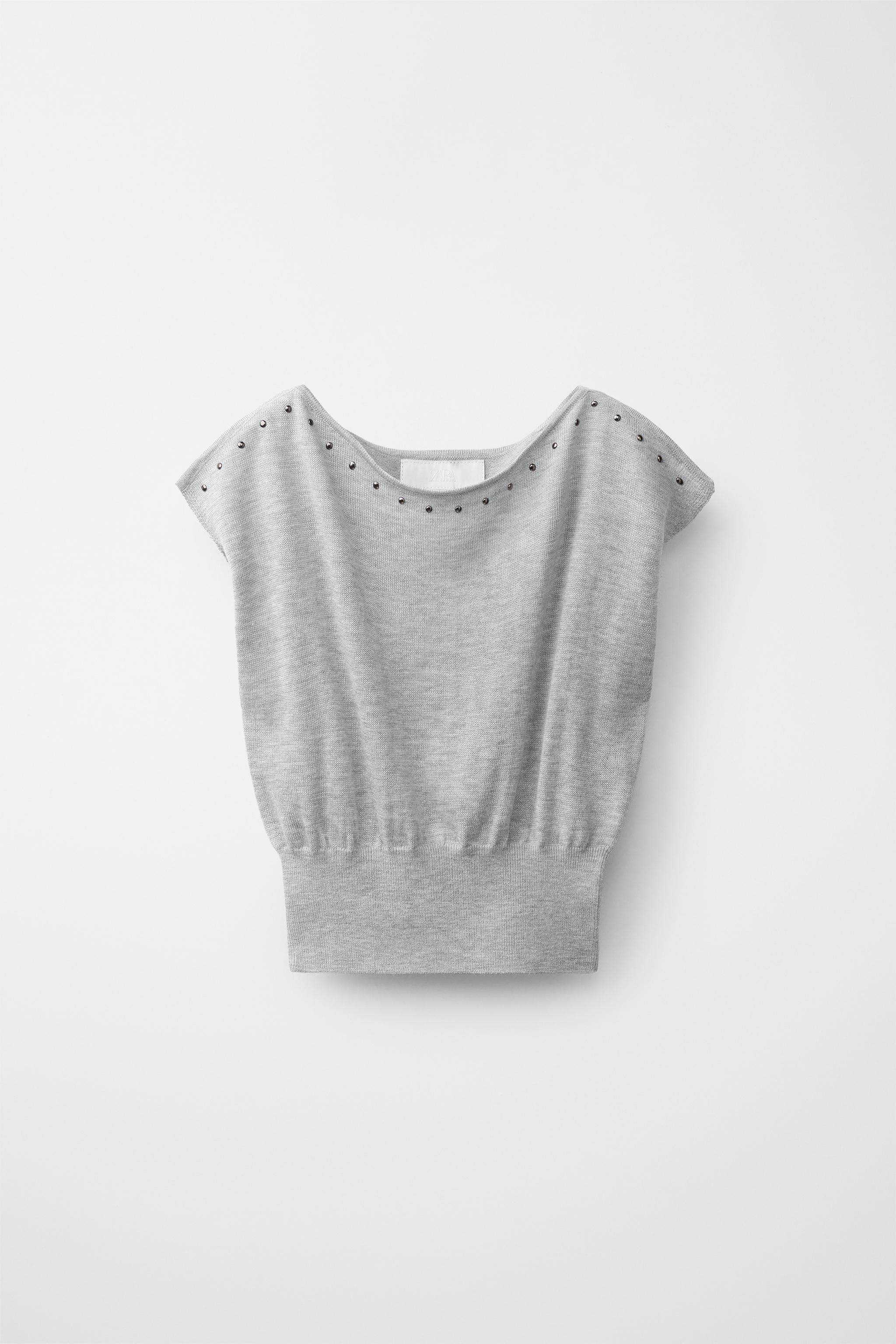 TOP EN MAILLE À CLOUS