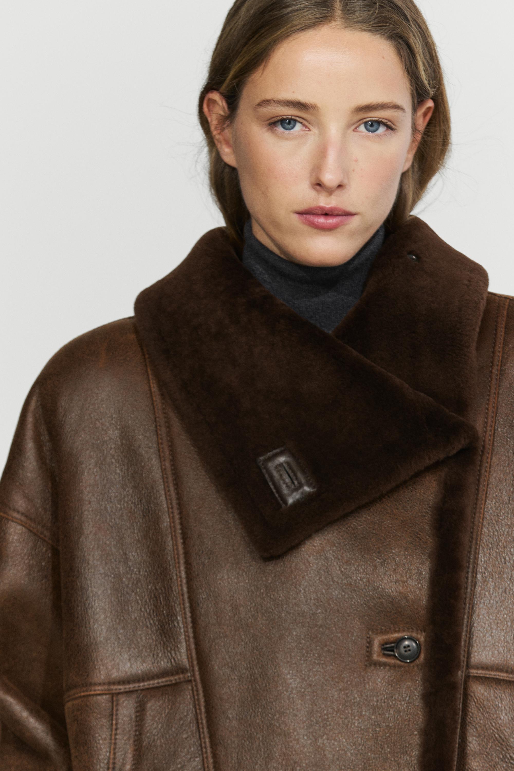 Manteau double face en cuir, daim et fourrure